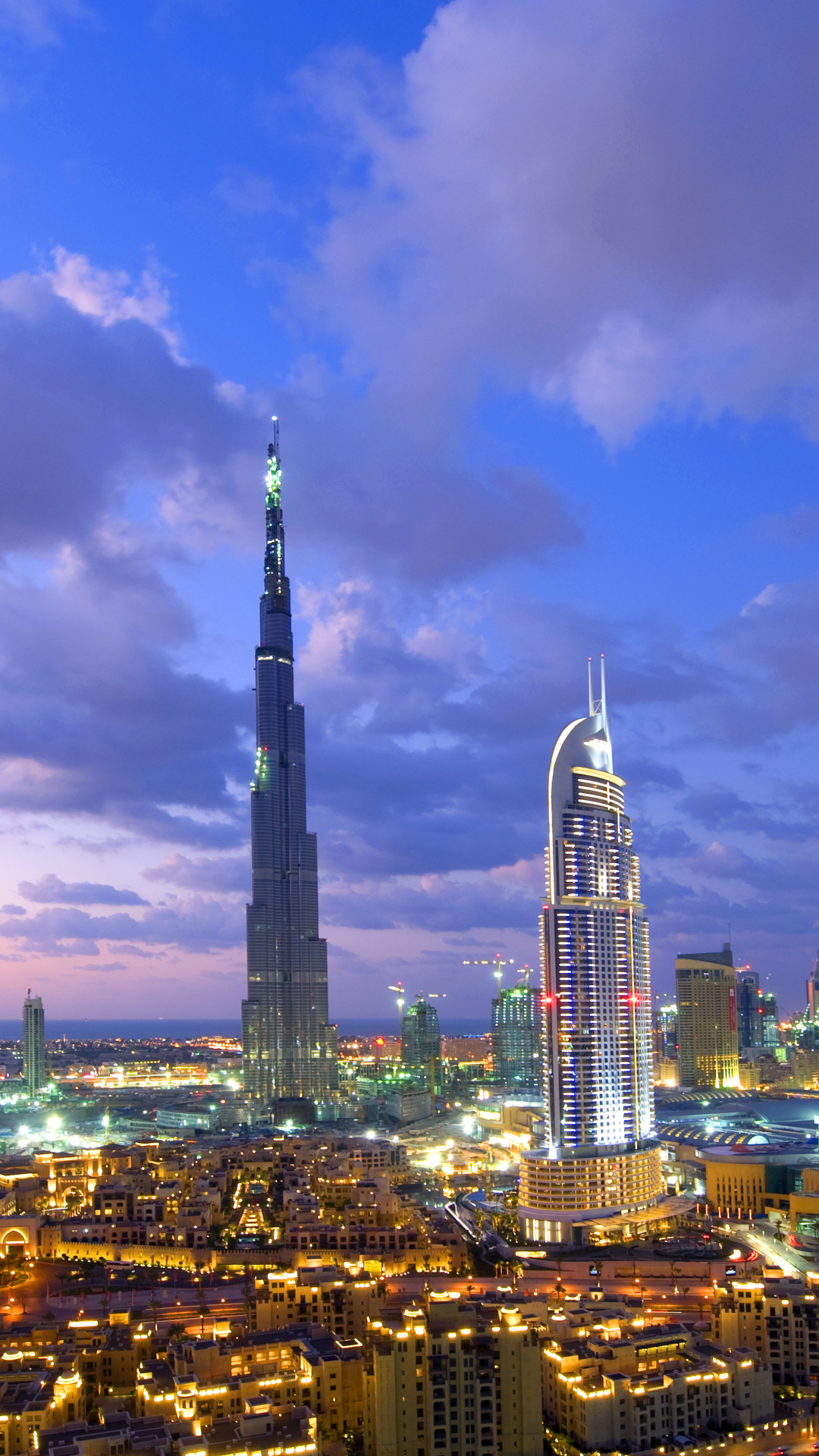 Handy-Wallpaper Städte, Stadt, Dubai, Wolke, Himmel, Burj Khalifa, Menschengemacht, Großstadt kostenlos herunterladen.