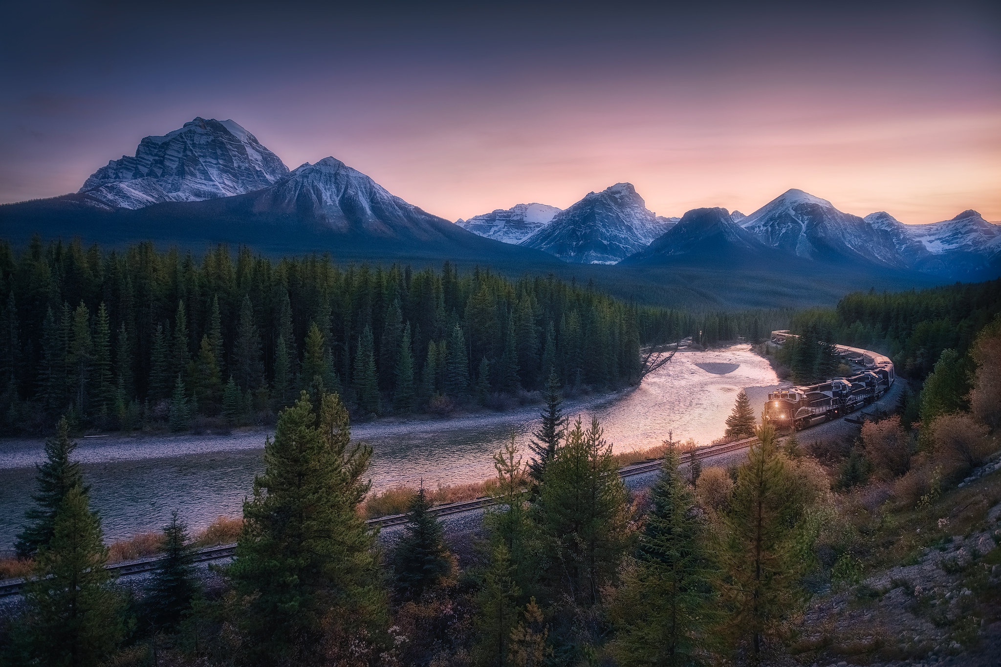 Download mobile wallpaper Mountain, Canada, River, Train, Alberta, Railroad, Banff National Park, Vehicles for free.