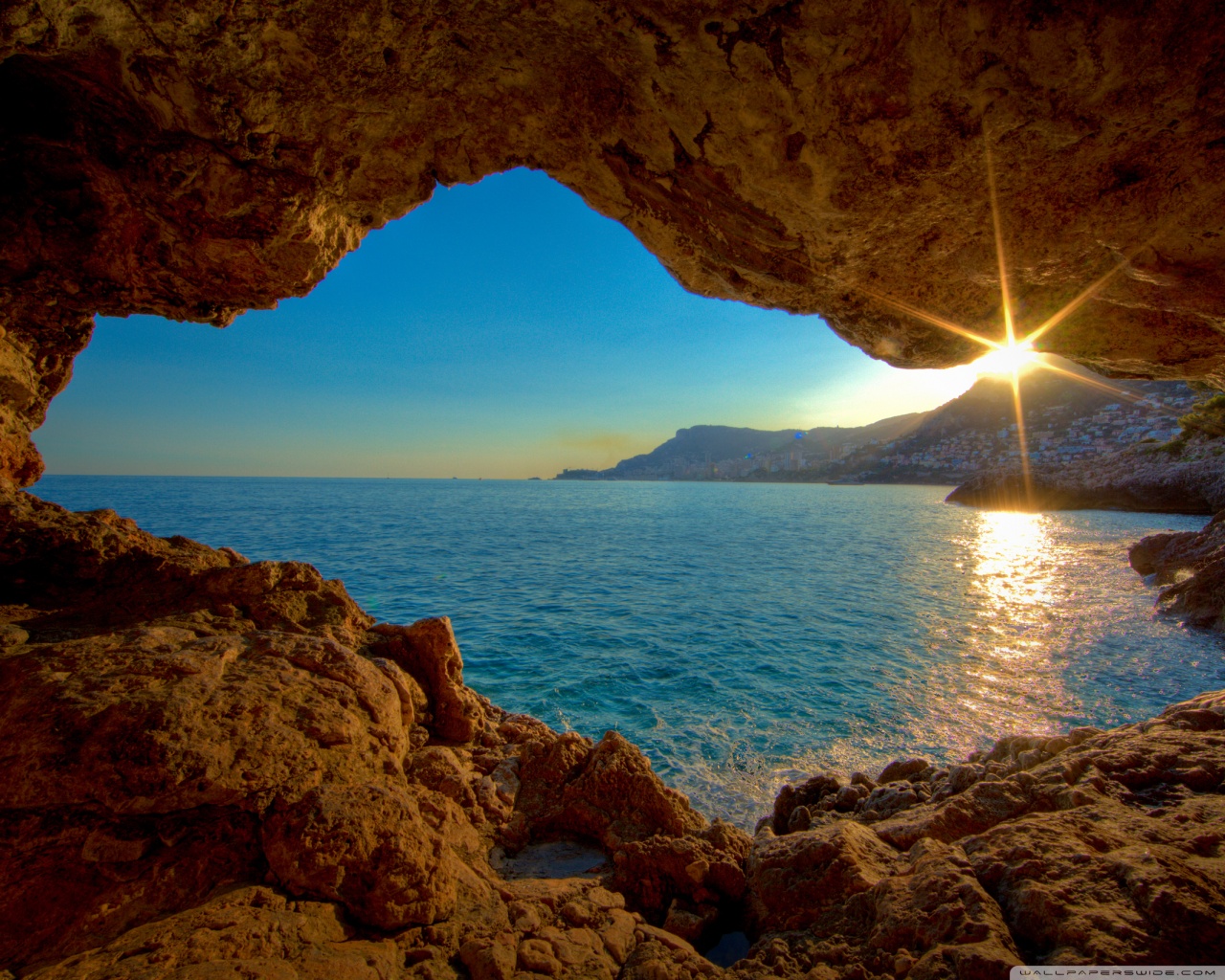 Download mobile wallpaper Sunset, Sea, Coast, Earth, Cave for free.