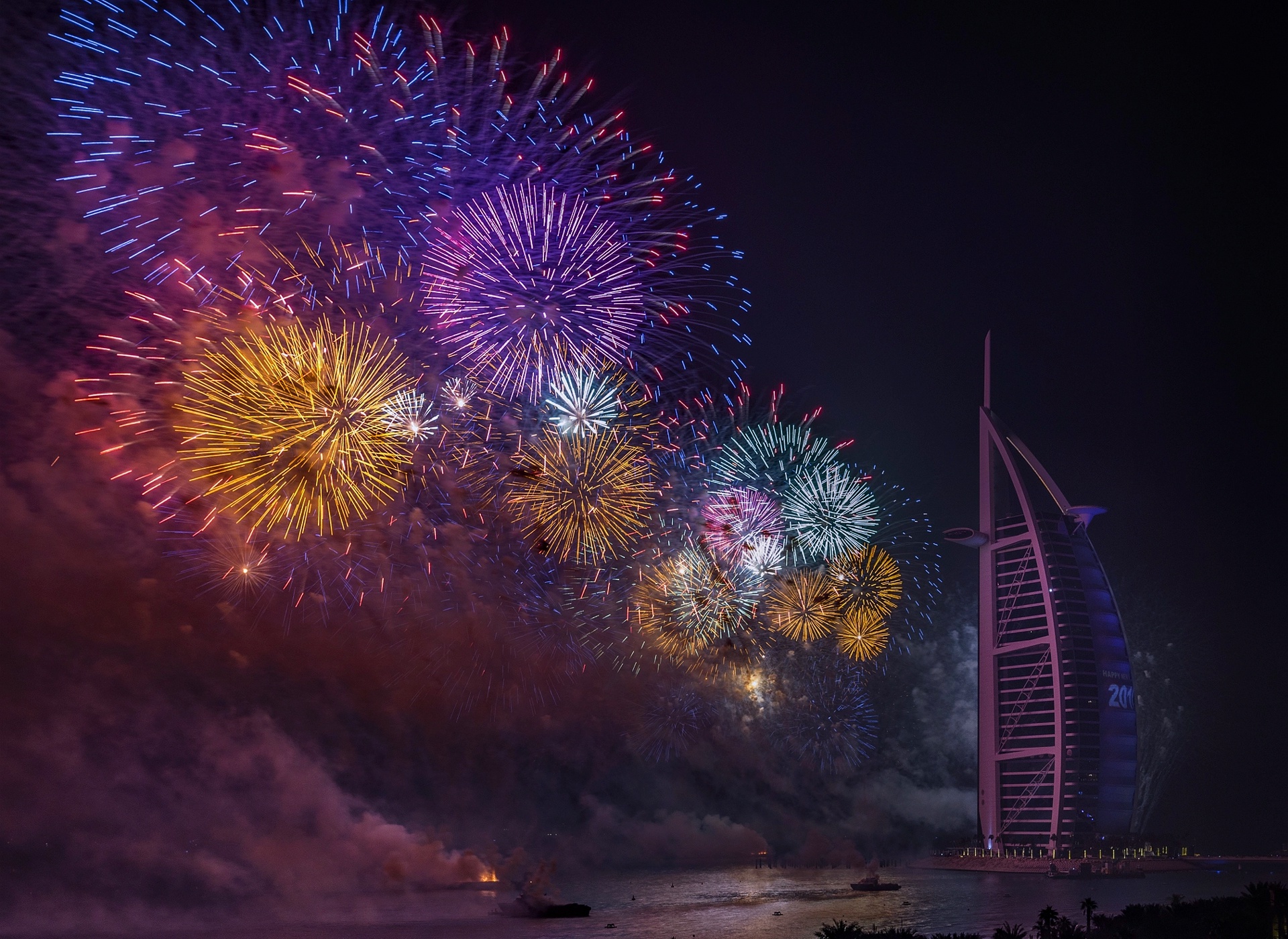 Free download wallpaper Night, Building, Dubai, Fireworks, Photography, United Arab Emirates, Burj Al Arab on your PC desktop