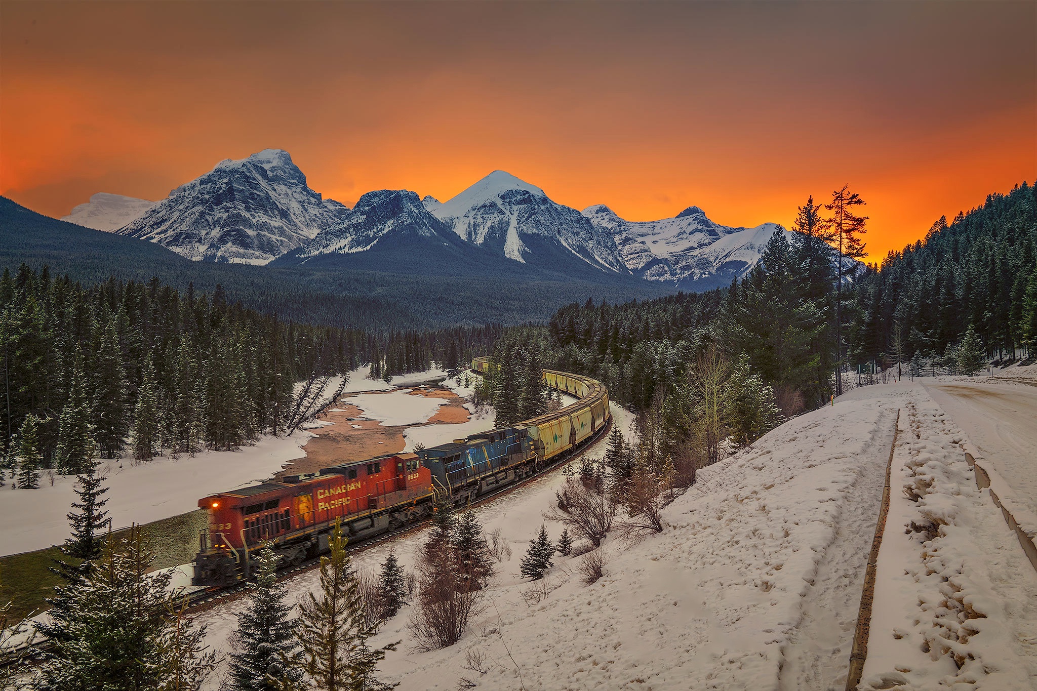 Download mobile wallpaper Mountain, Canada, Forest, Train, Vehicles for free.