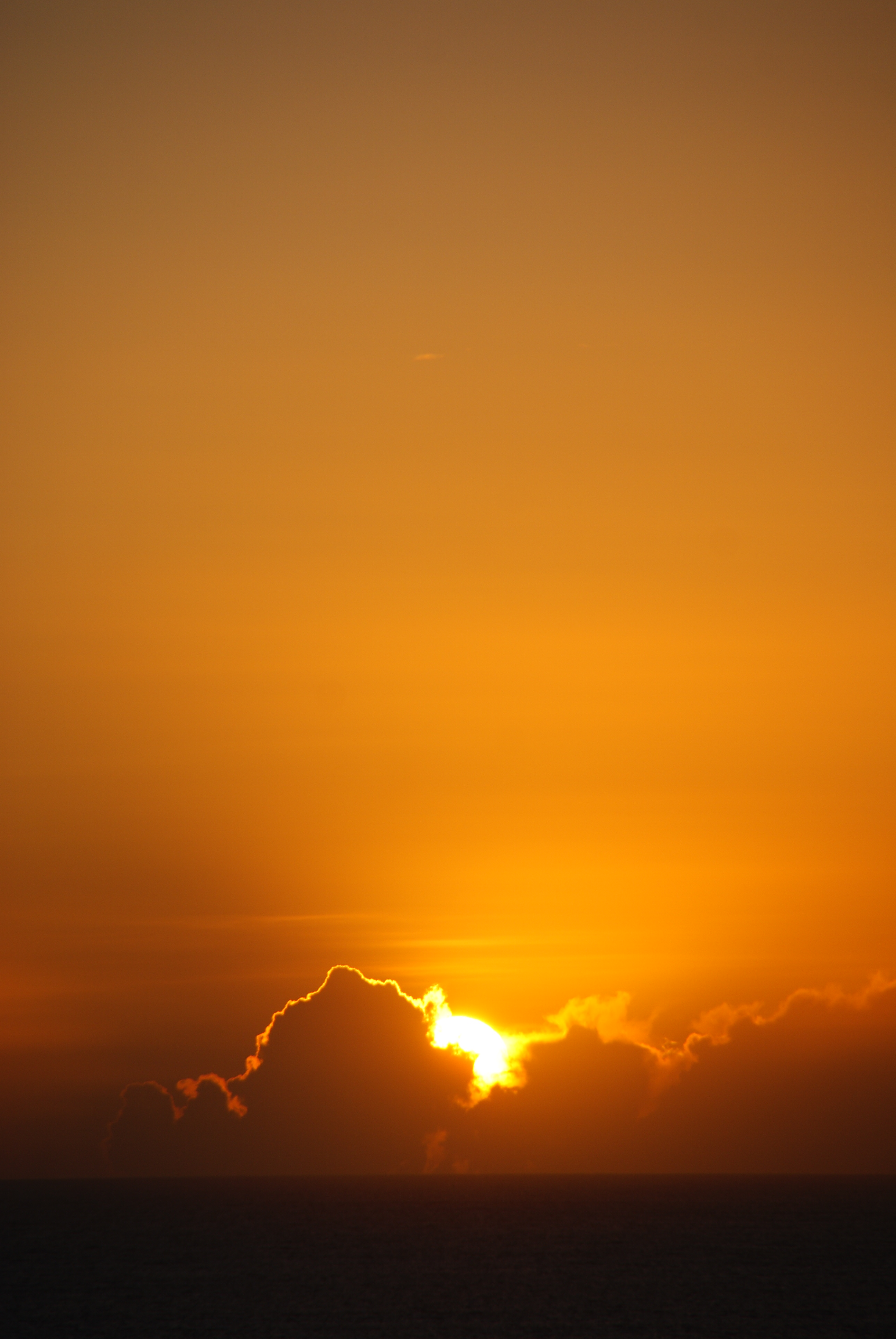 Download mobile wallpaper Clouds, Horizon, Sun, Nature, Glow, Sunset for free.