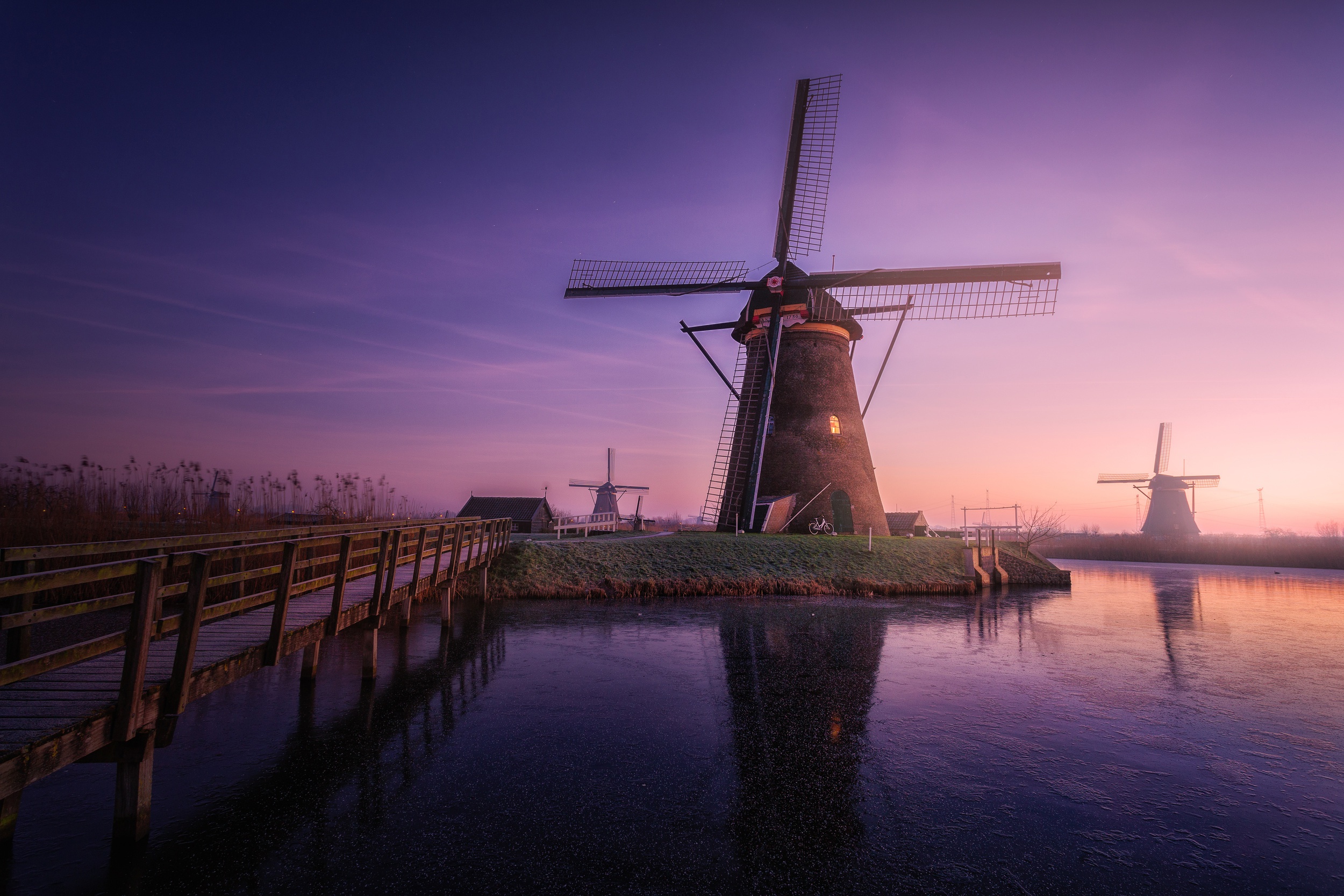 Free download wallpaper Sky, Building, Reflection, Sunrise, Windmill, Man Made on your PC desktop