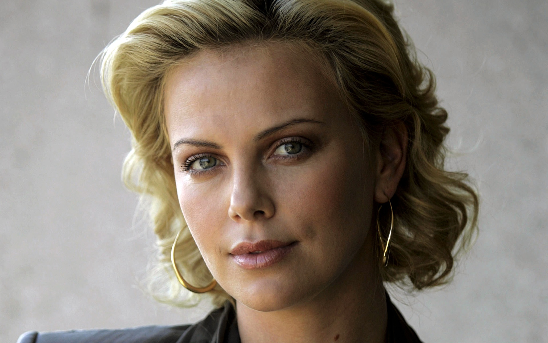 Download mobile wallpaper Charlize Theron, Blonde, Face, Earrings, Green Eyes, Celebrity, Actress, South African for free.