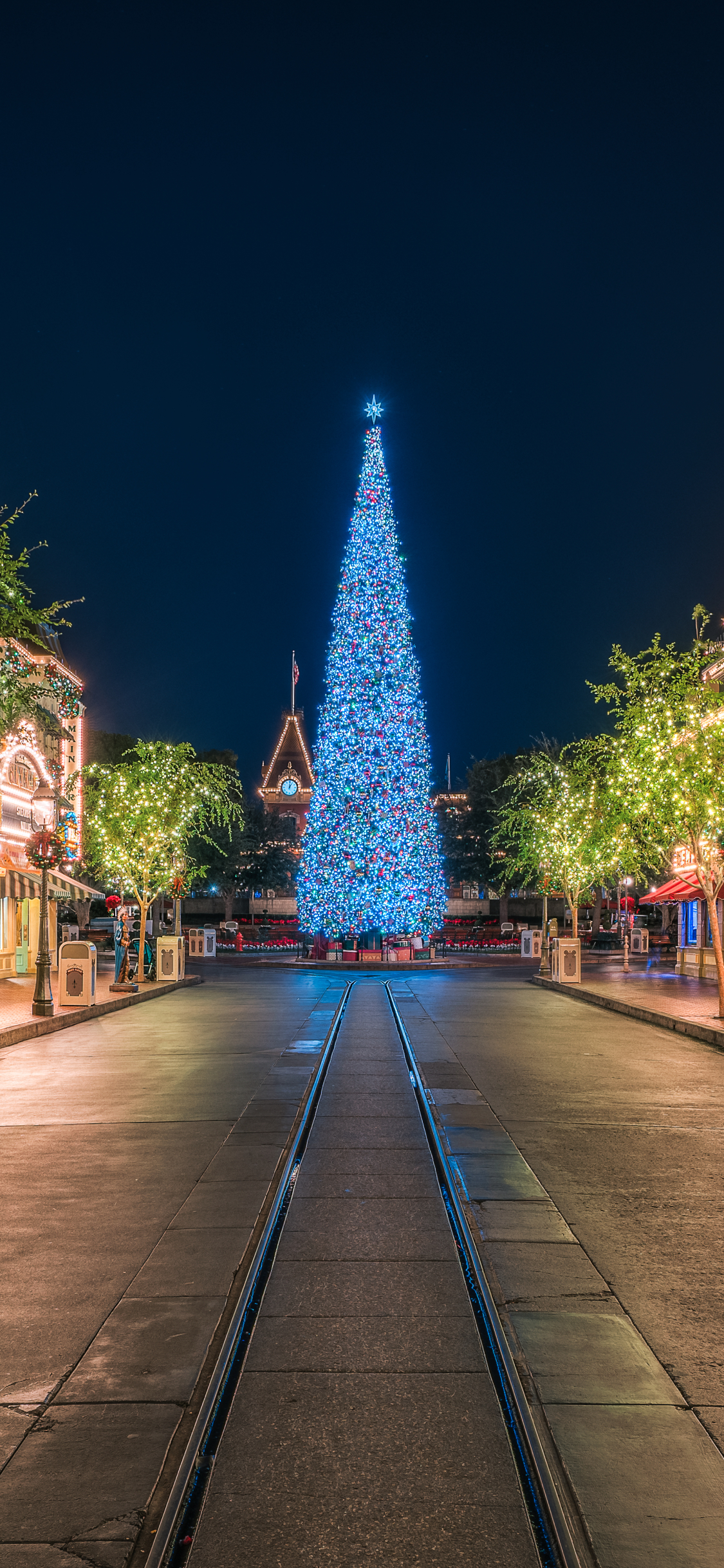 Download mobile wallpaper Disneyland, Light, Christmas, Square, Christmas Tree, California, Man Made, Disney for free.