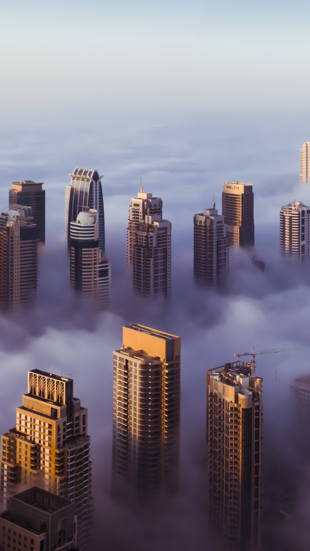 Скачать картинку Города, Облака, Туман, Дубай, Утро, Панорама, Облако, Объединенные Арабские Эмираты, Объединённые Арабские Эмираты, Сделано Человеком, Шейх Заид Авеню в телефон бесплатно.