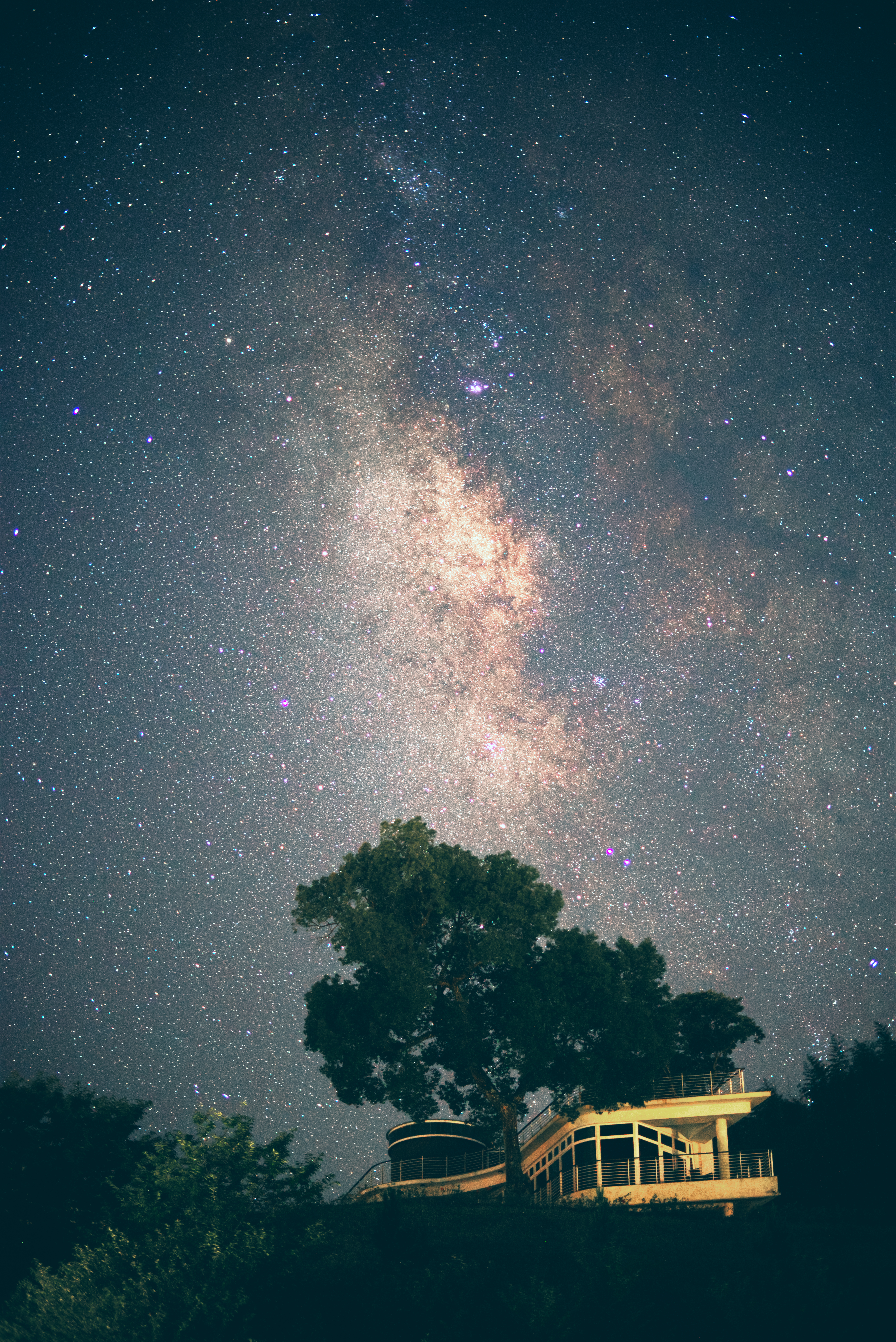 Download mobile wallpaper Building, Wood, Nature, Tree, Stars, Starry Sky, Night for free.
