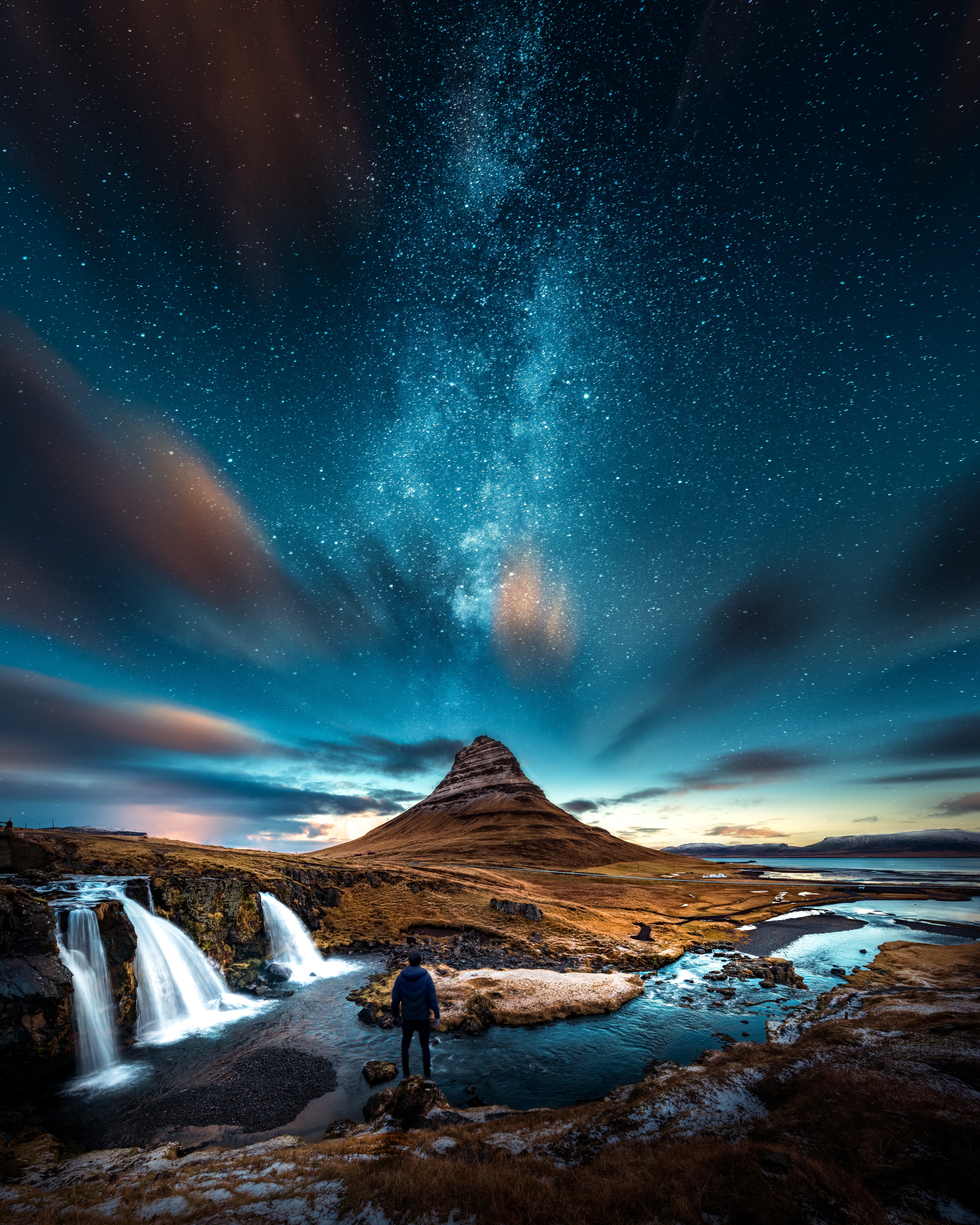 Download mobile wallpaper Human, Waterfall, Rivers, Mountains, Person, Nature, Starry Sky for free.