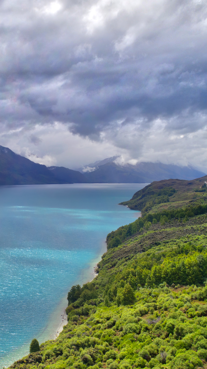 Download mobile wallpaper Landscape, Lakes, Mountain, Lake, New Zealand, Earth, Cloud, Highway, Lake Wakatipu for free.