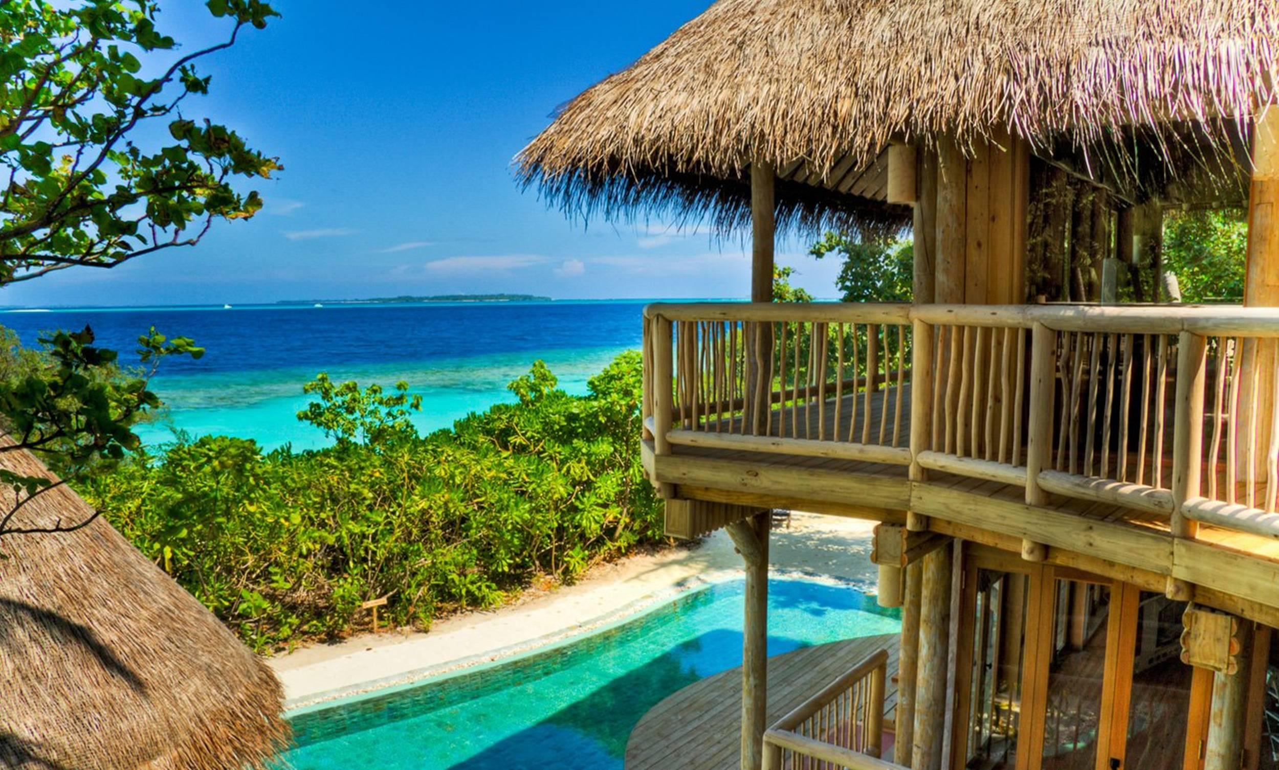 Download mobile wallpaper Tree, Ocean, Tropical, Hut, Resort, Maldives, Man Made for free.