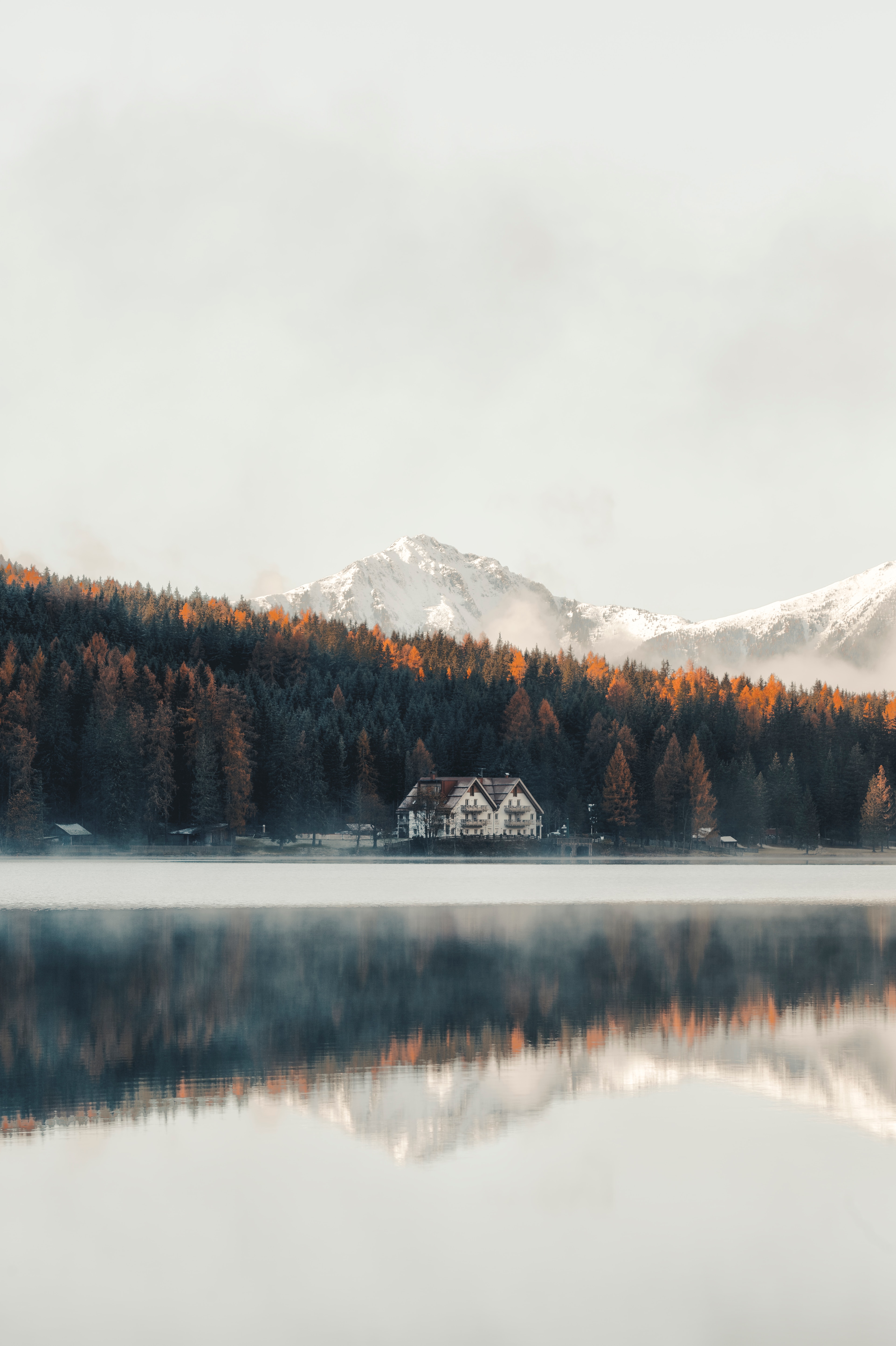 Download mobile wallpaper Shore, Bank, Nature, Mountains, Lake, Forest, House for free.