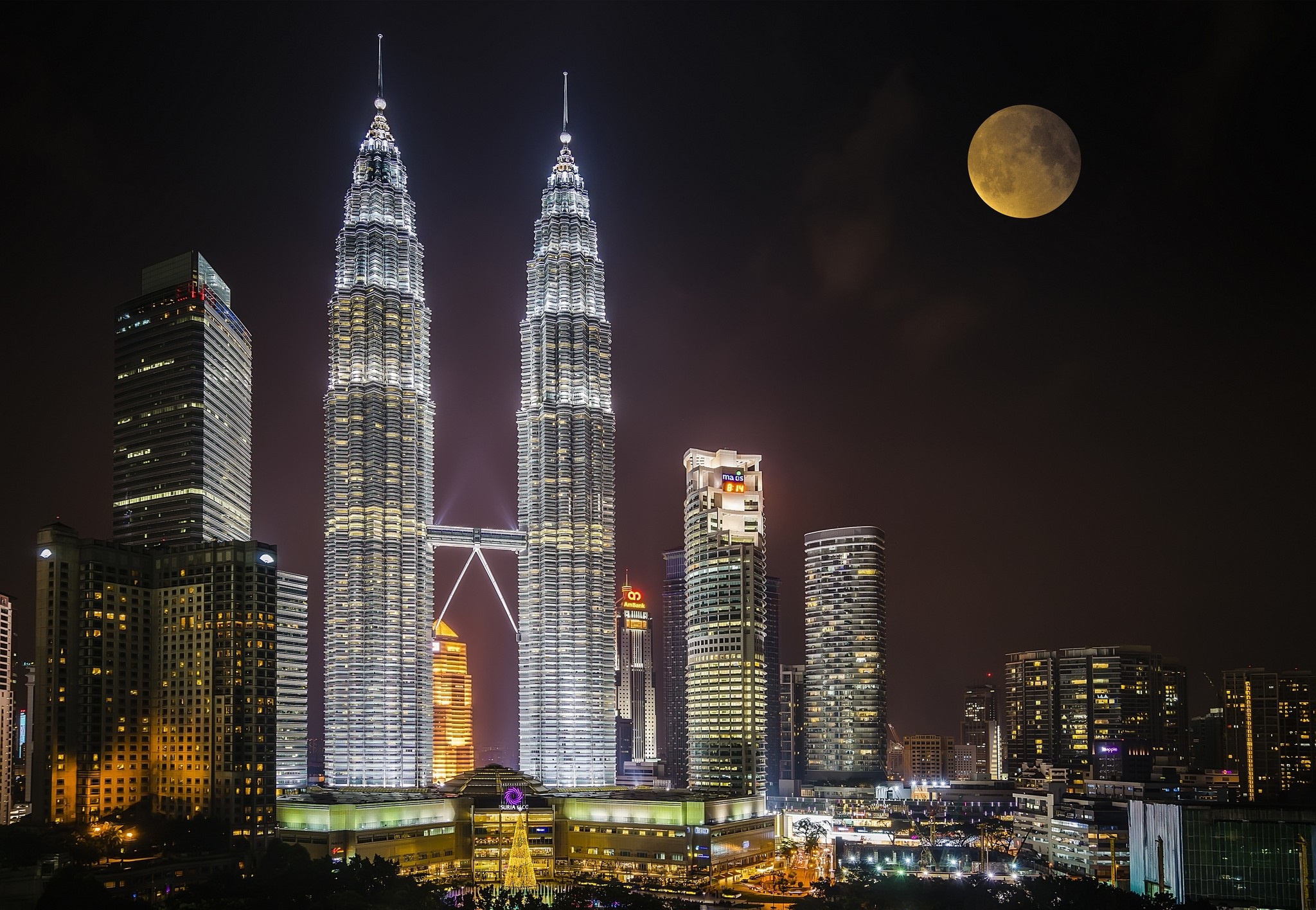 Download mobile wallpaper Night, Moon, City, Skyscraper, Building, Kuala Lumpur, Malaysia, Man Made, Petronas Towers for free.