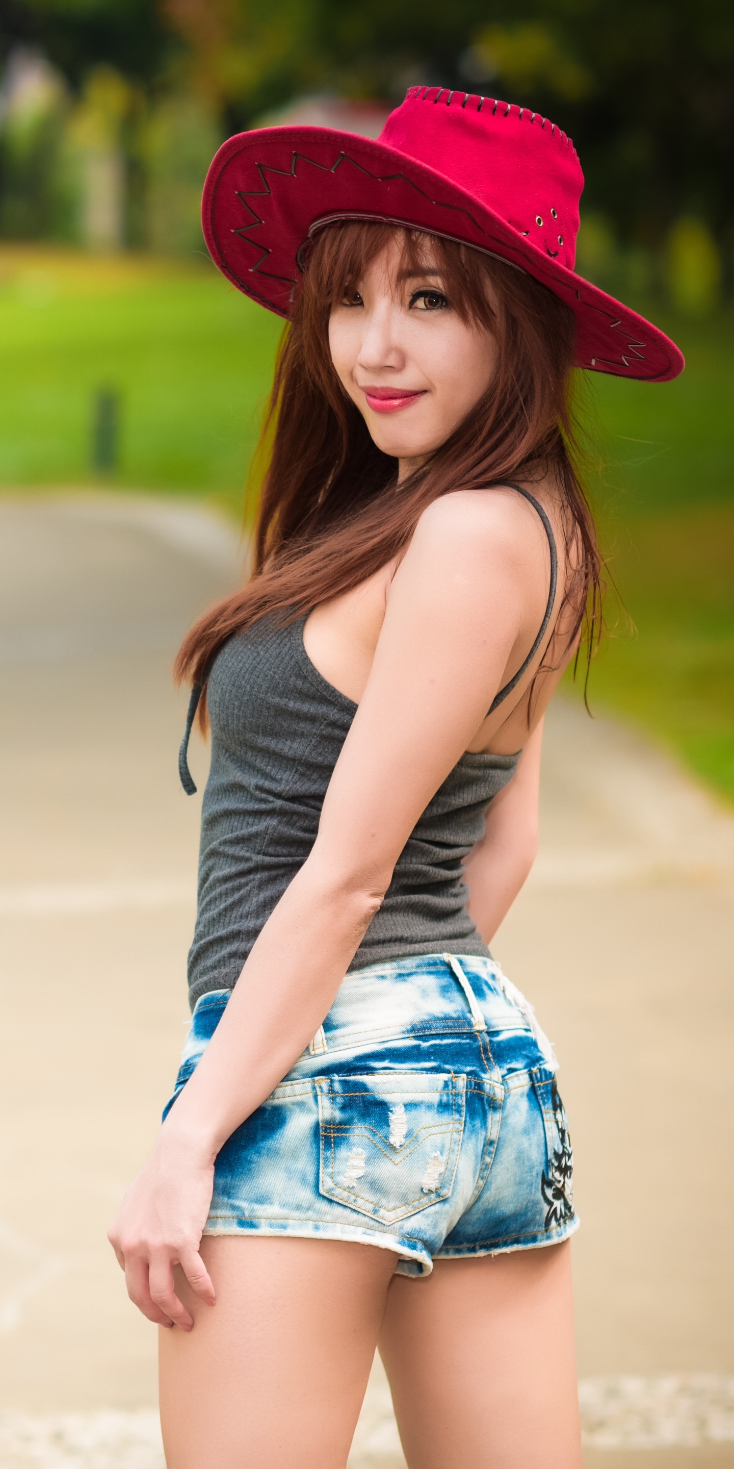 Download mobile wallpaper Hat, Brunette, Model, Women, Shorts, Asian, Lipstick, Depth Of Field for free.