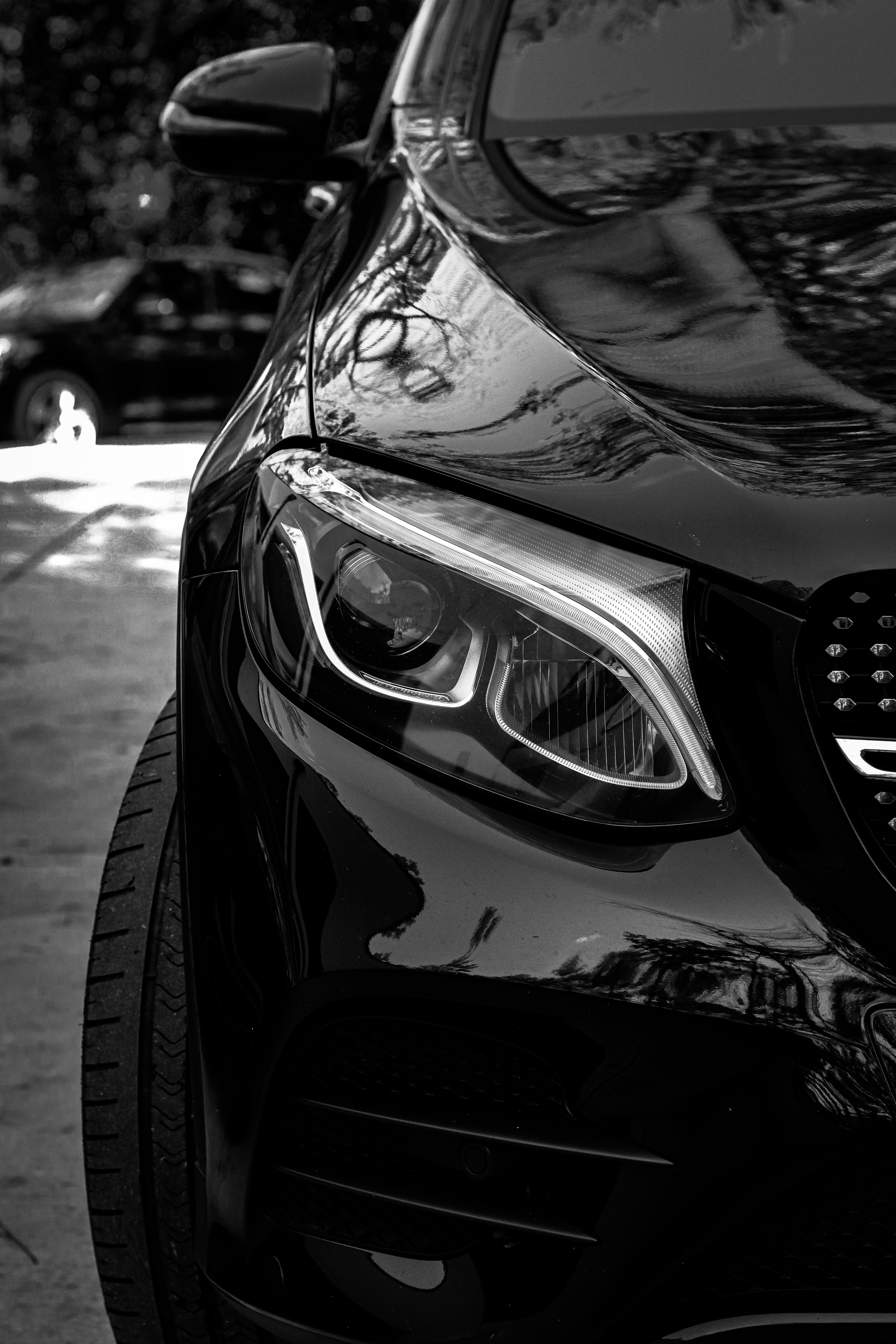 Download background car, cars, black, front view, machine, bw, chb, headlight