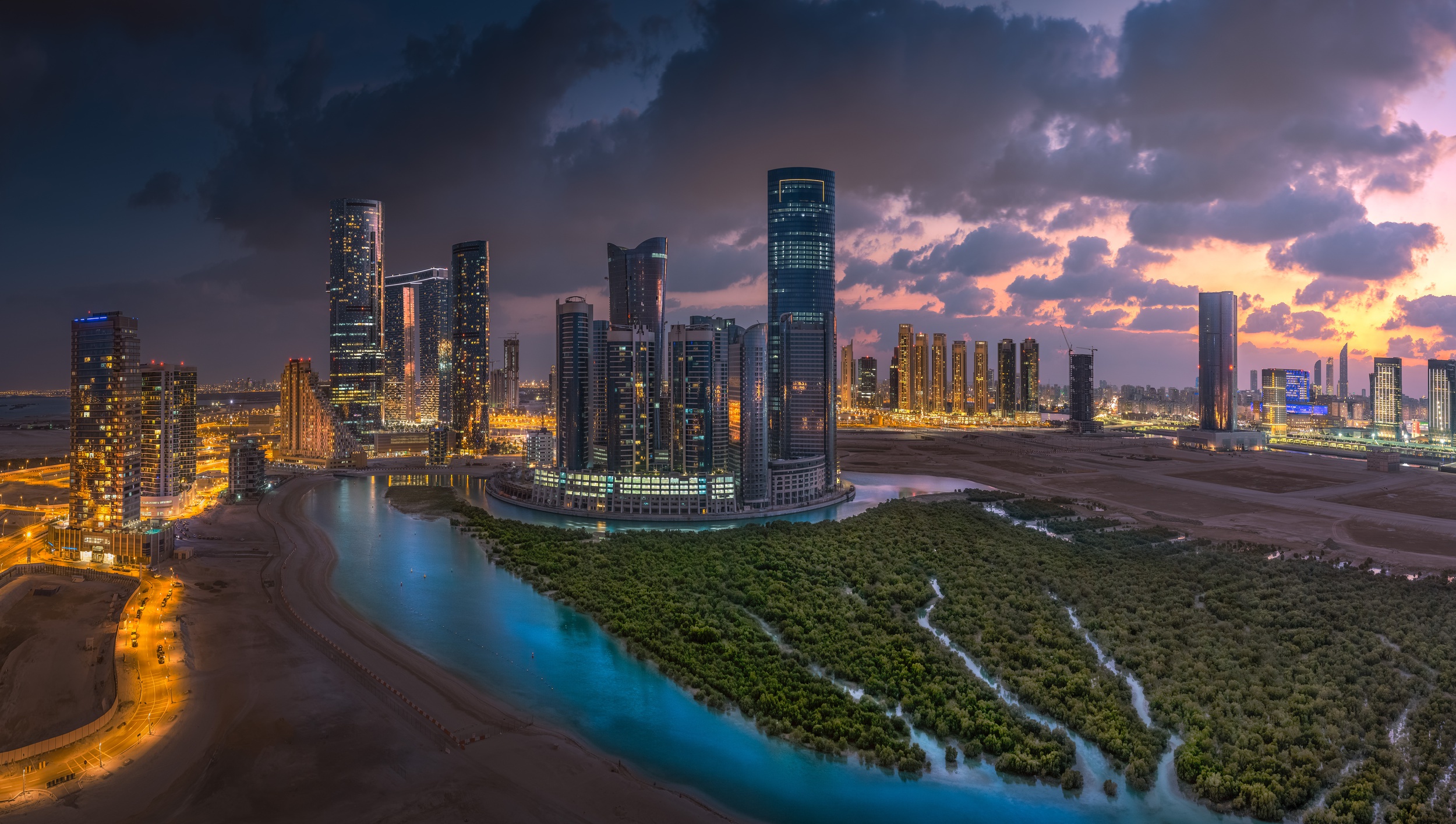 411200 descargar fondo de pantalla hecho por el hombre, abu dhabi, edificio, ciudad, noche, rascacielos, emiratos árabes unidos, ciudades: protectores de pantalla e imágenes gratis