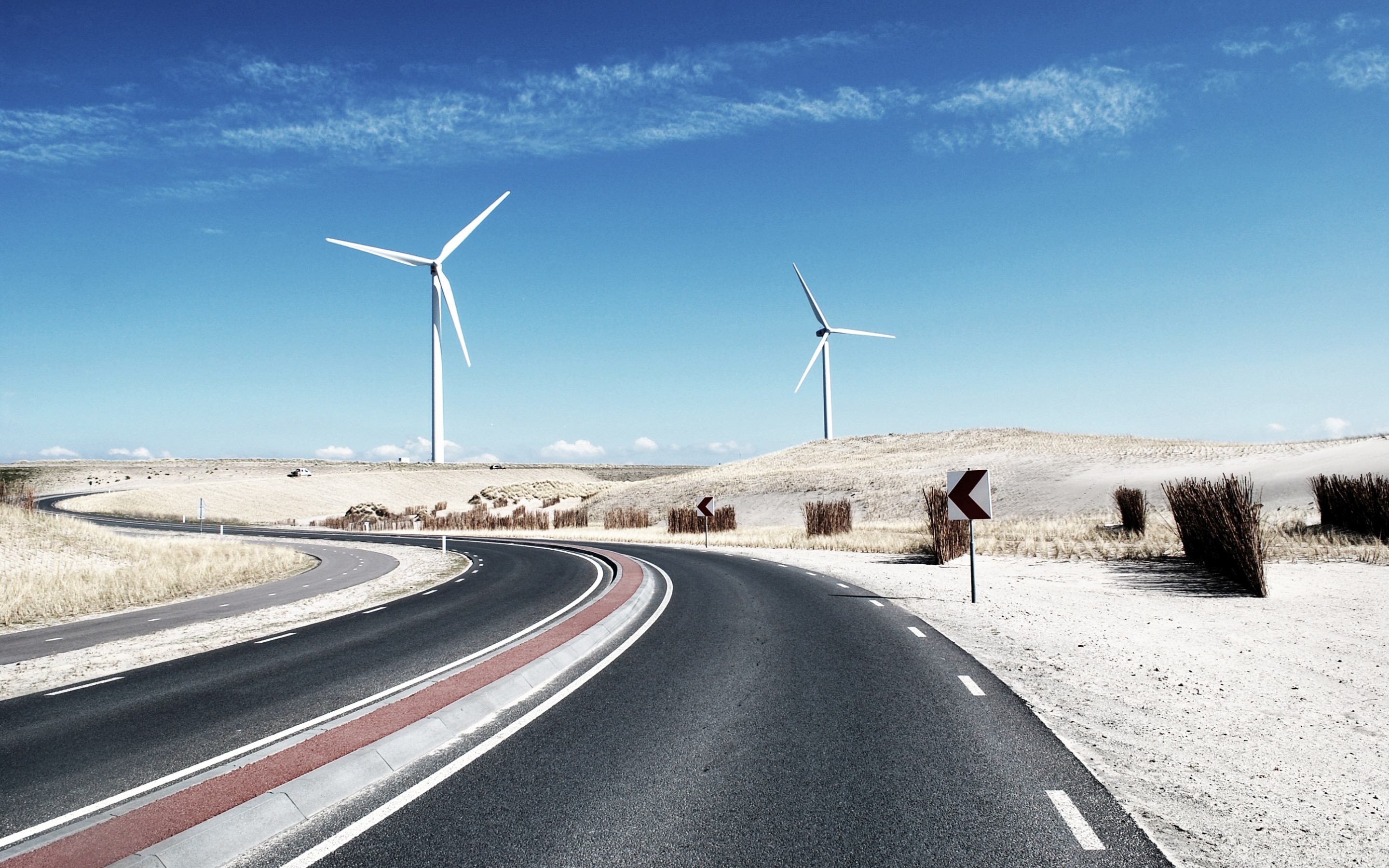 Download mobile wallpaper Sky, Desert, Road, Wind Turbine, Man Made for free.