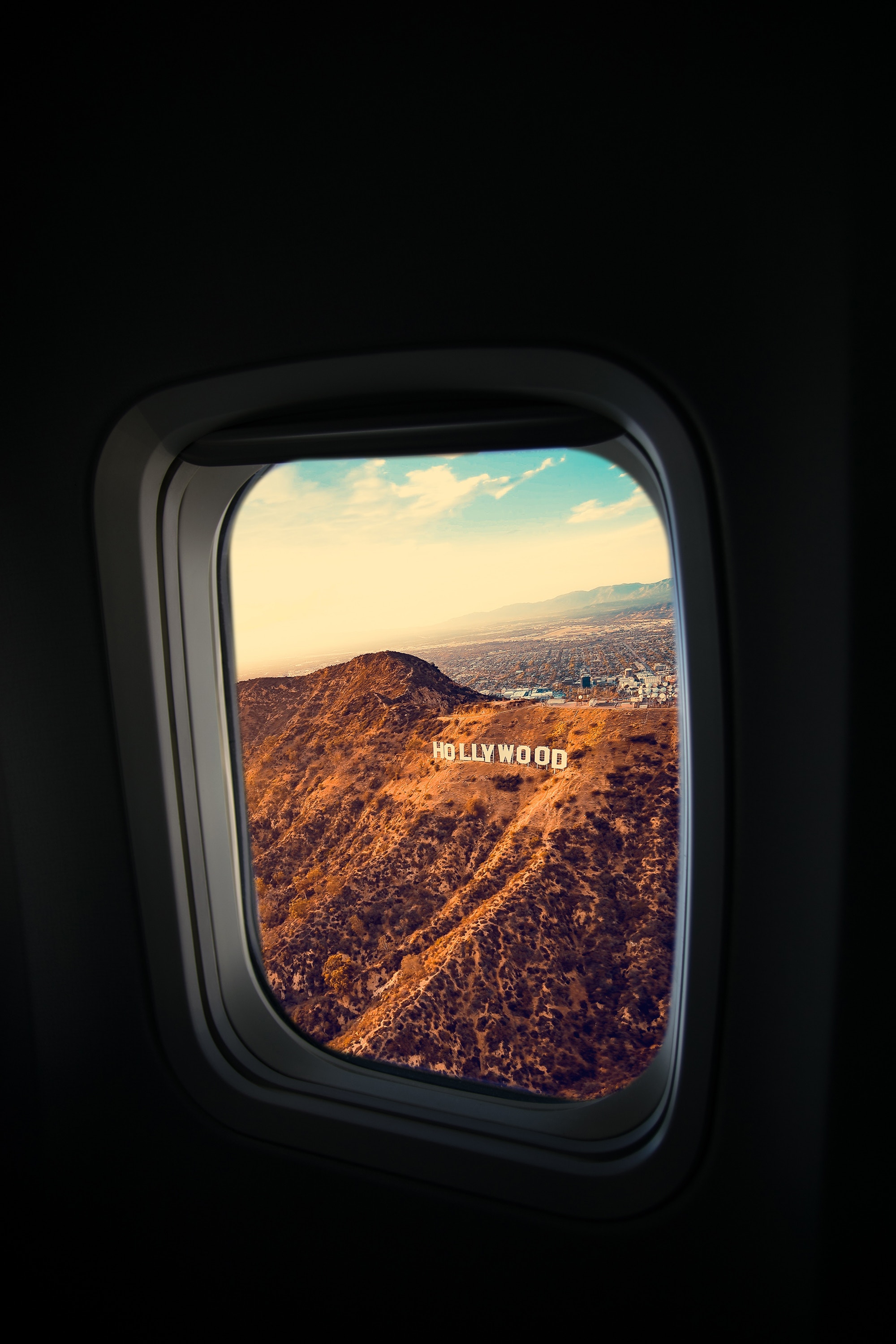 74908 скачать картинку лос анджелес, знак голливуда, сша, иллюминатор, разное, полет, окно, самолет - обои и заставки бесплатно