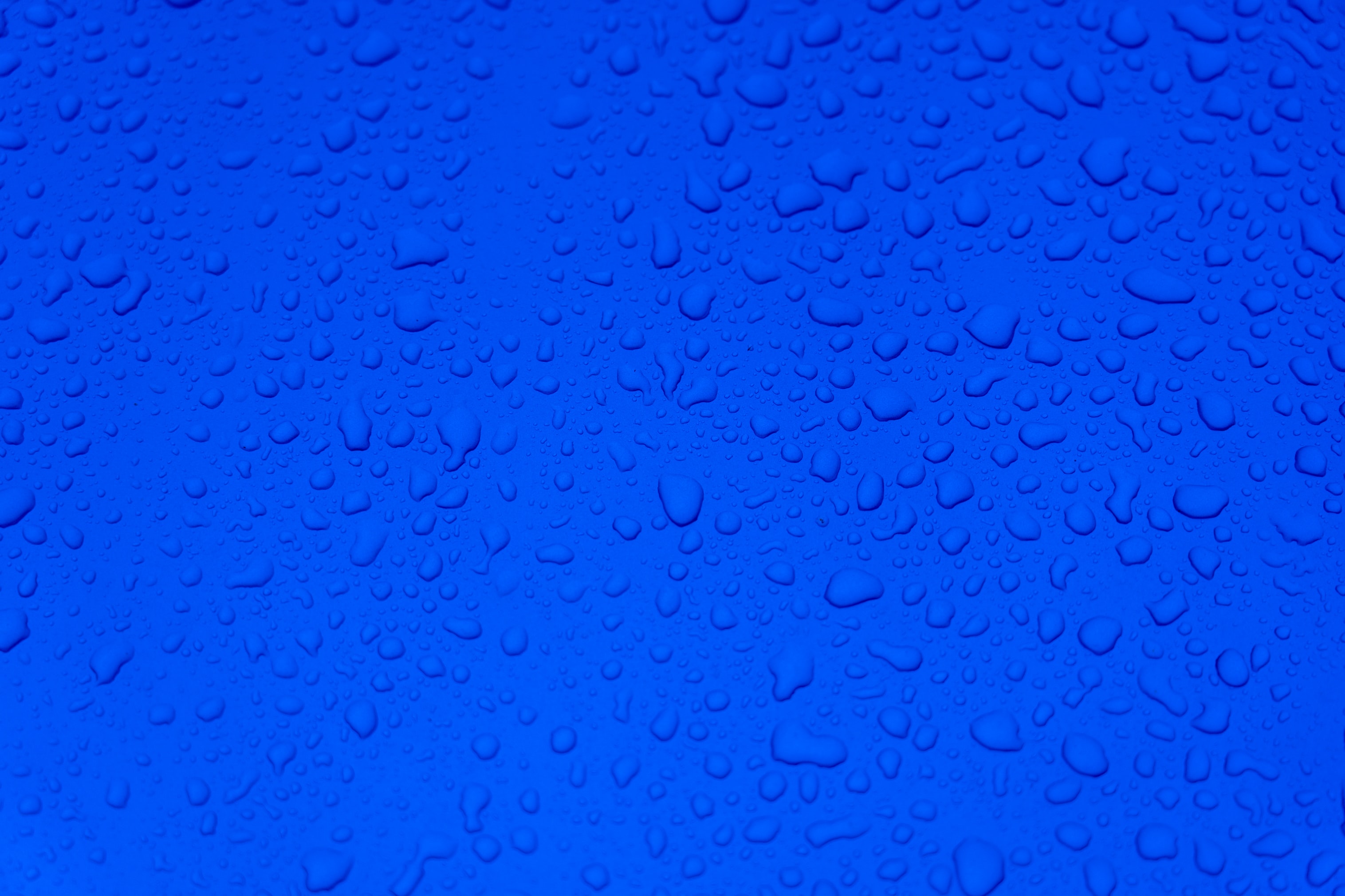 62553 скачать обои синий, поверхность, капли, вода, макро - заставки и картинки бесплатно