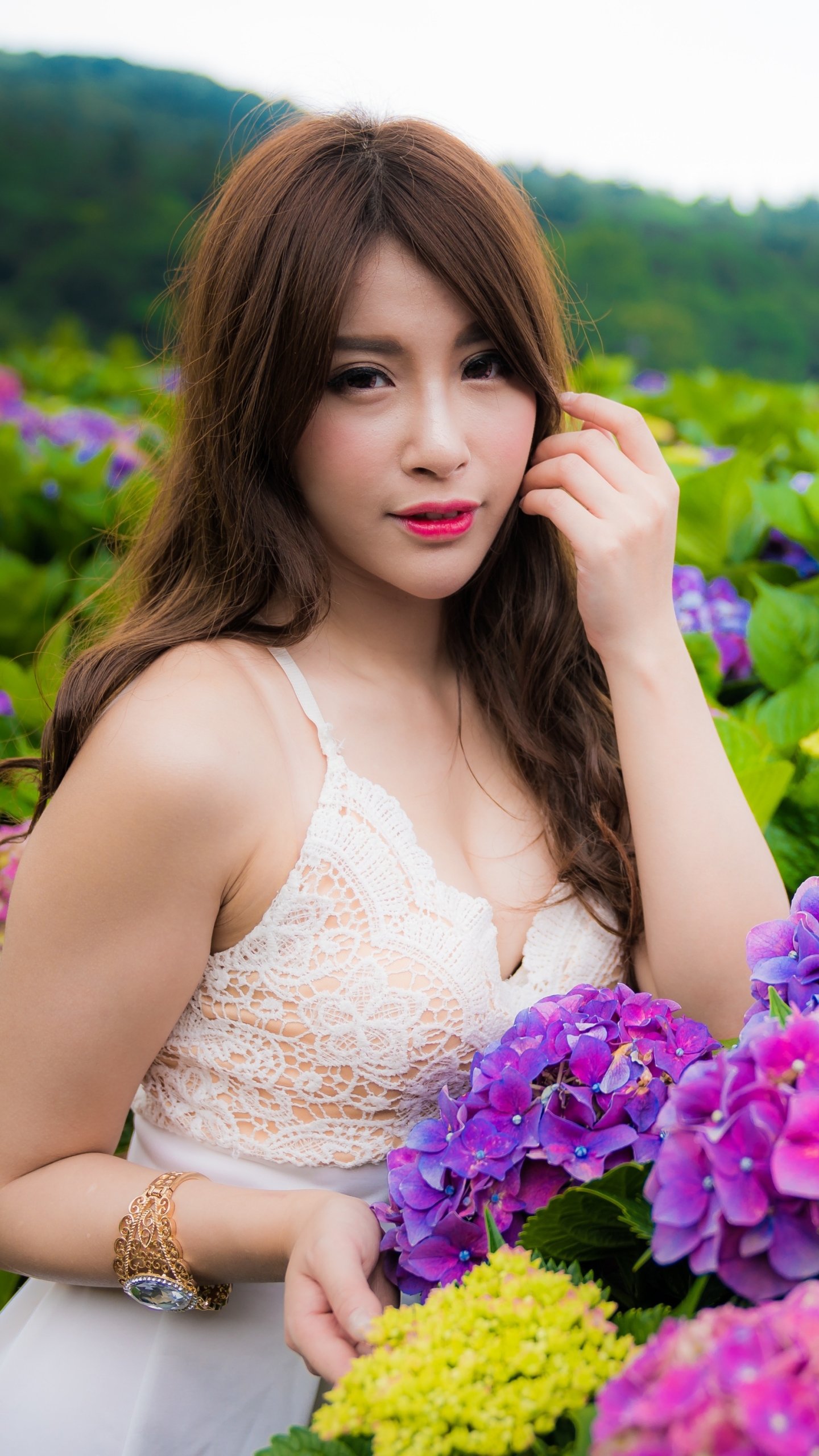 Download mobile wallpaper Flower, Hydrangea, Dress, Brunette, Model, Women, Asian, Purple Flower, Long Hair, Lipstick for free.