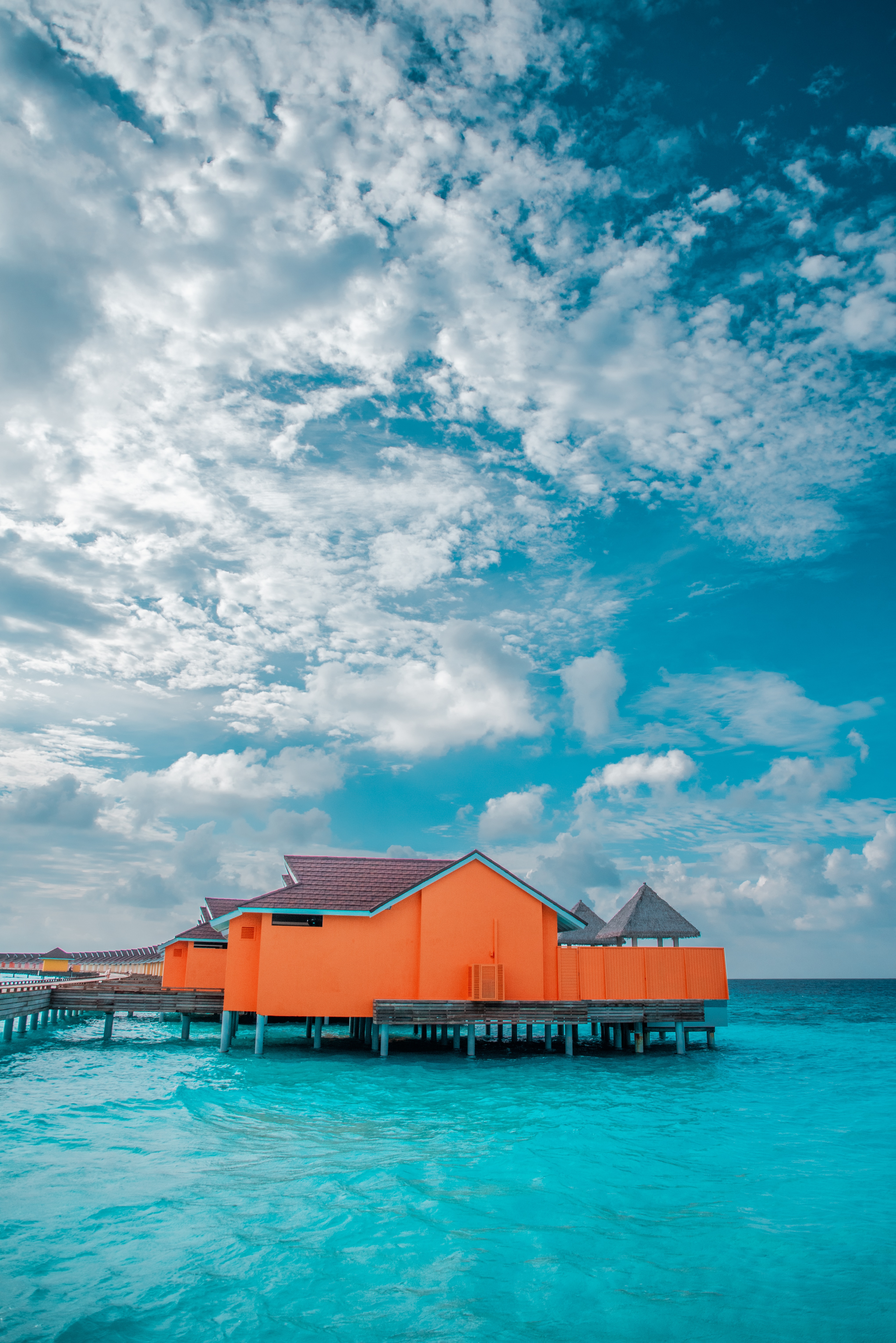 Download mobile wallpaper Nature, Pier, House, Water, Ocean, Tropics for free.
