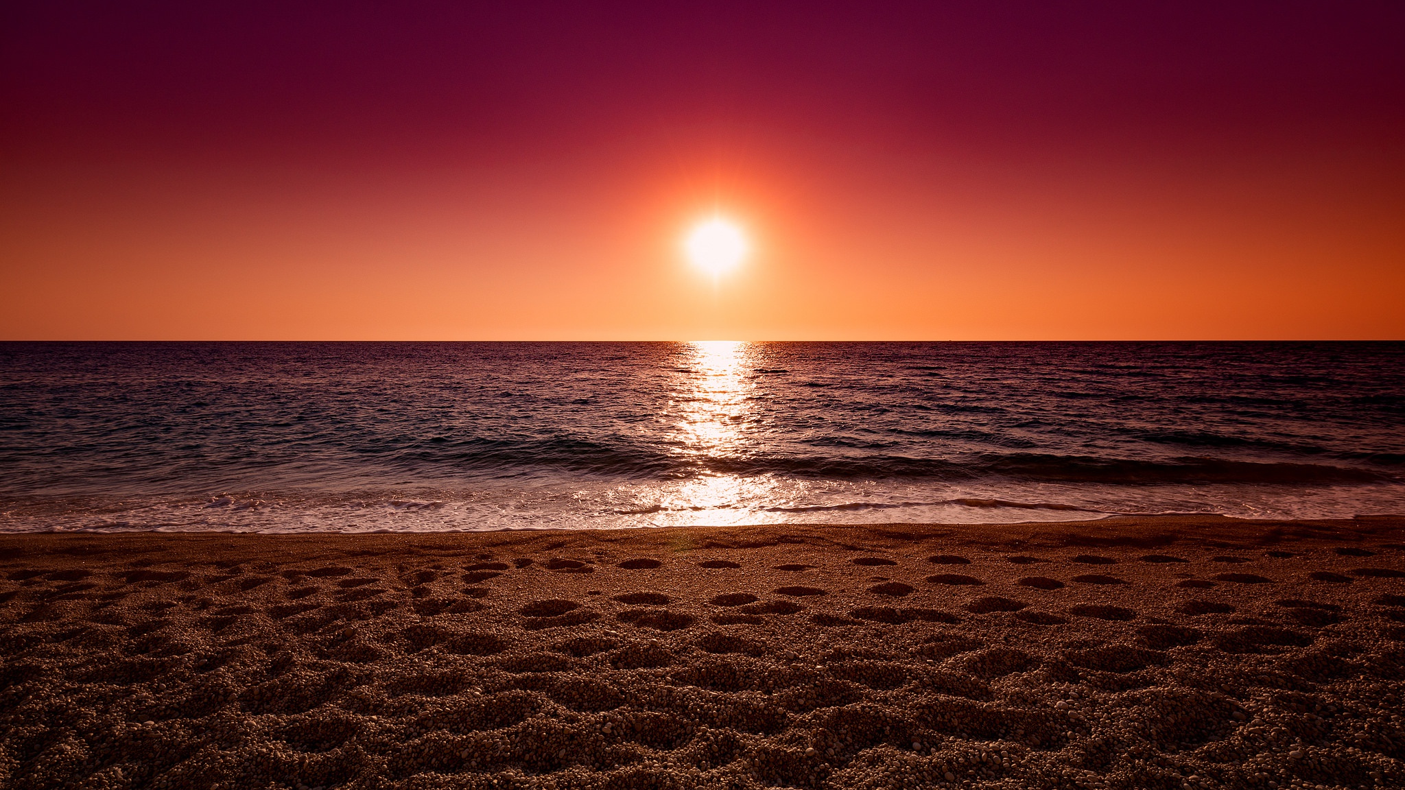Download mobile wallpaper Nature, Sunset, Sun, Sand, Horizon, Ocean, Earth for free.