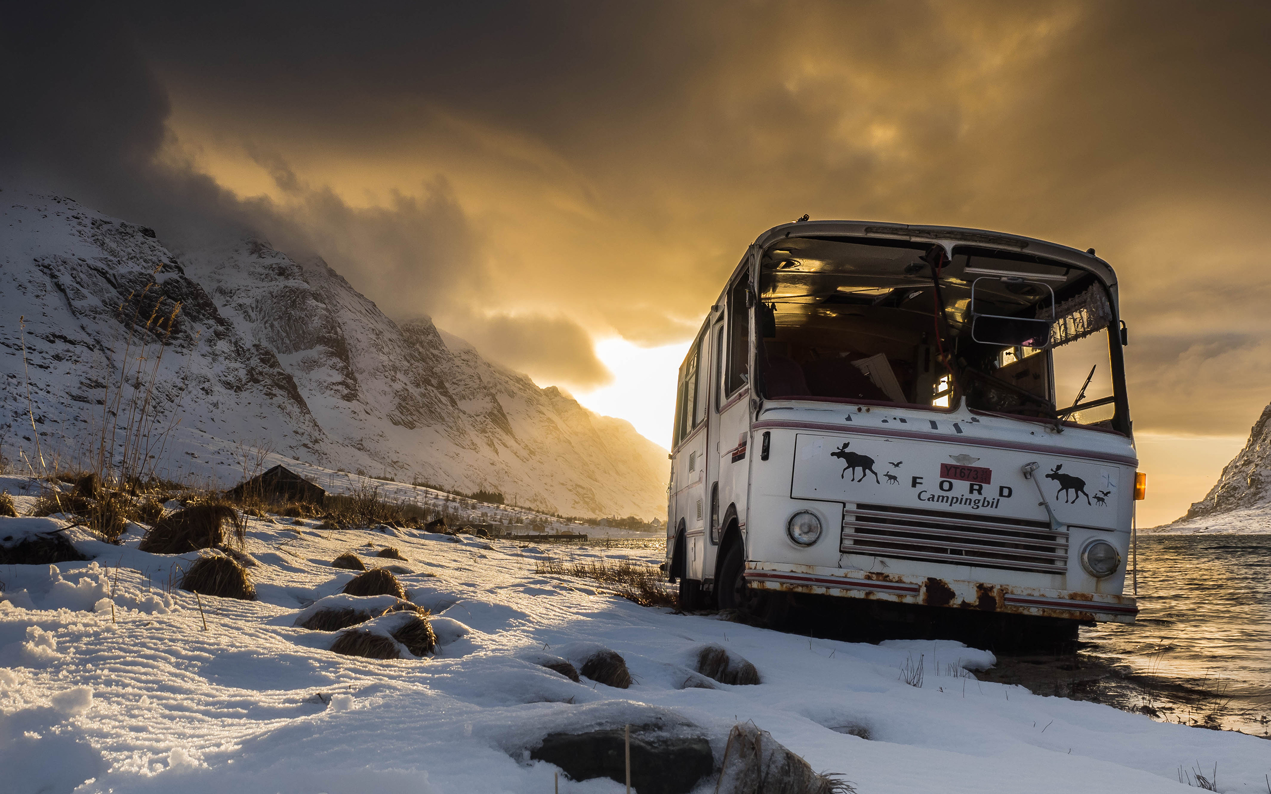 Free download wallpaper Sunset, Snow, Ford, Mountain, Bus, Wreck, Vehicles on your PC desktop