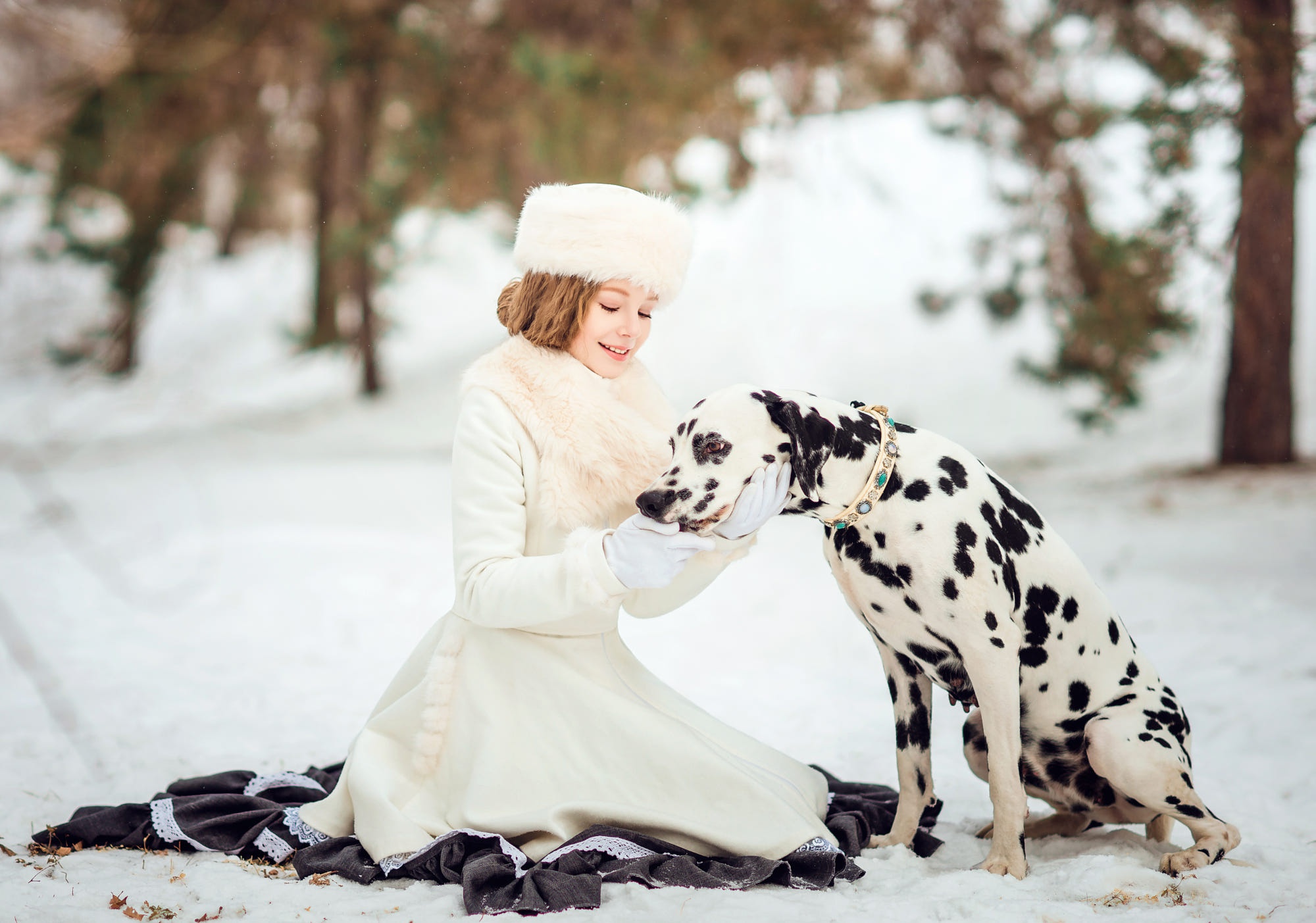 Download mobile wallpaper Winter, Dog, Dalmatian, Hat, Coat, Model, Women for free.