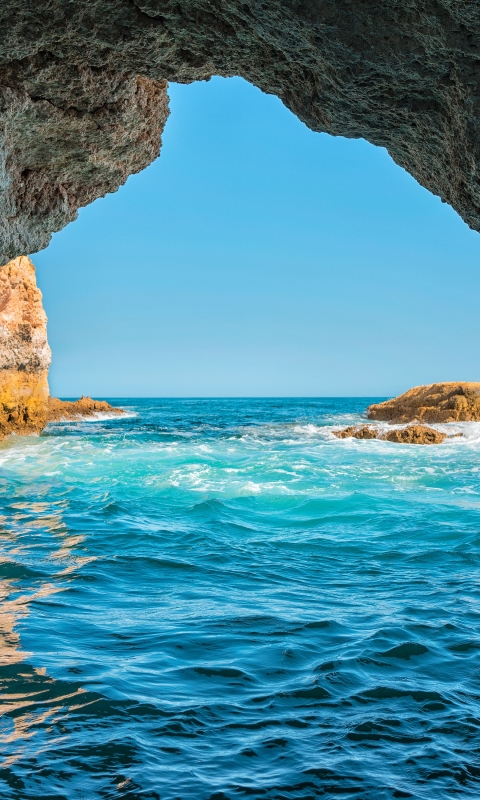 Скачать картинку Море, Пещеры, Горизонт, Океан, Пещера, Португалия, Земля/природа в телефон бесплатно.