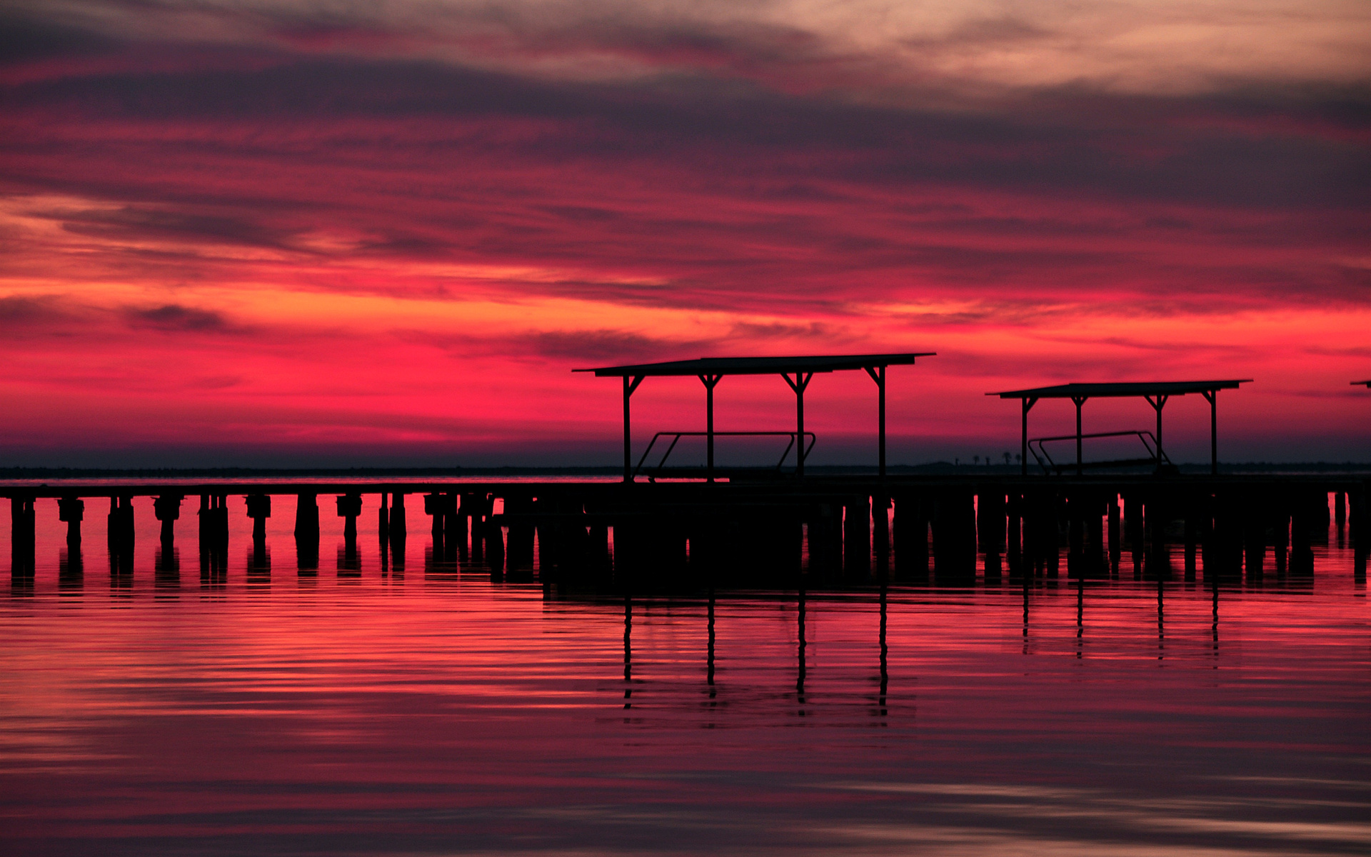 Download mobile wallpaper Pier, Scenic, Man Made, Lake, Cloud, Sky, Sunset for free.