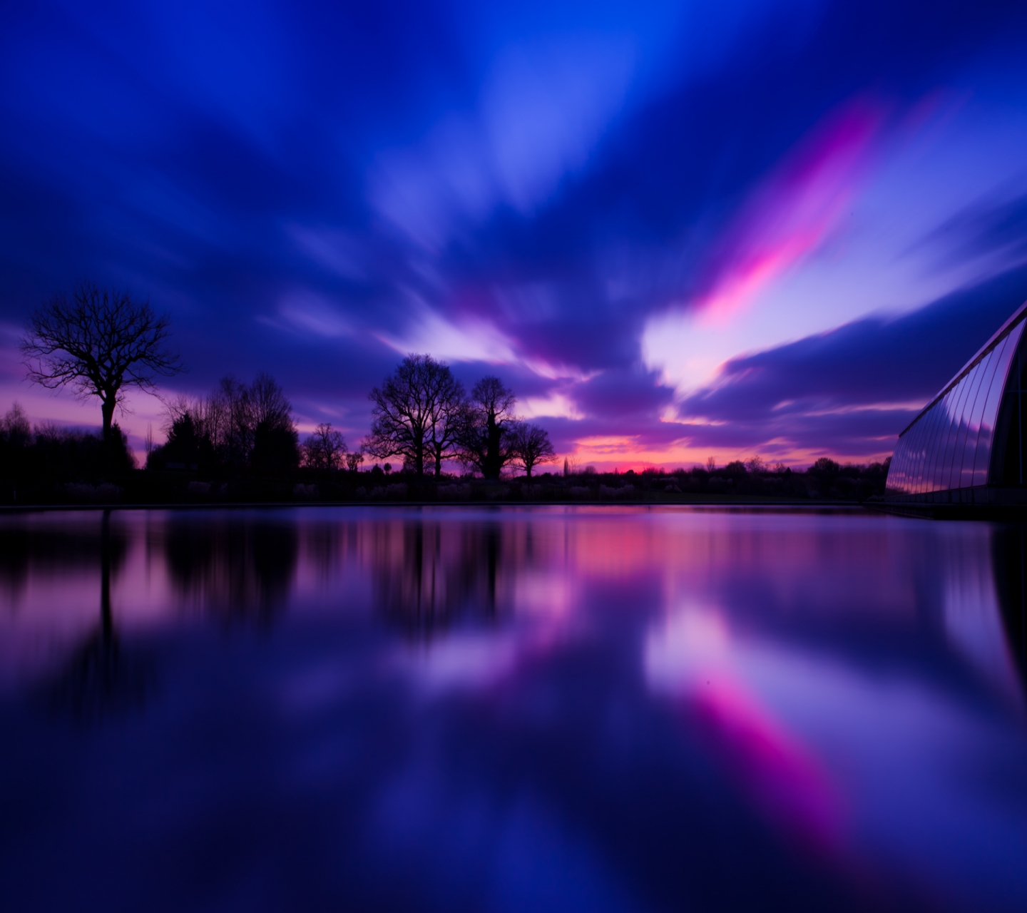 Download mobile wallpaper Sunset, Reflection, Tree, Earth, Evening, River, United Kingdom, Pastel, England for free.