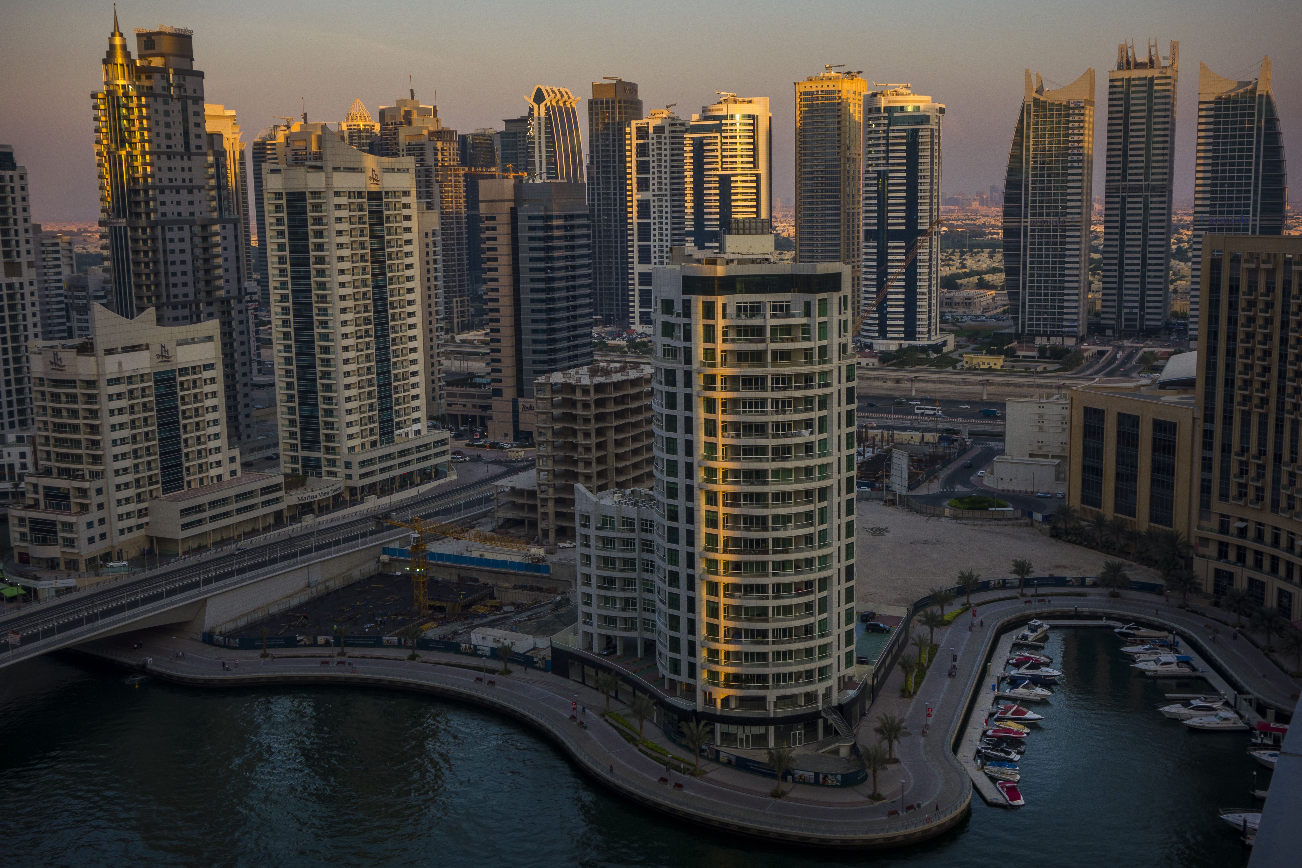 Free download wallpaper Cities, City, Skyscraper, Building, Dubai, Boat, Arab, Man Made on your PC desktop