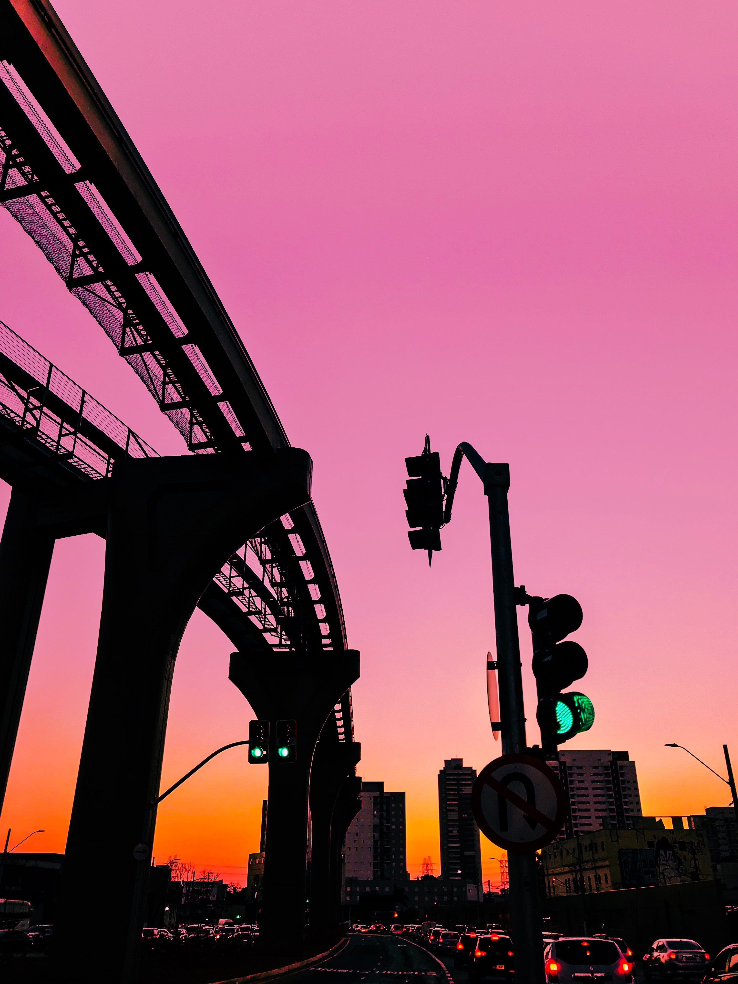 Download mobile wallpaper Traffic, Movement, City, Cities, Sky, Traffic Light, Sunset for free.