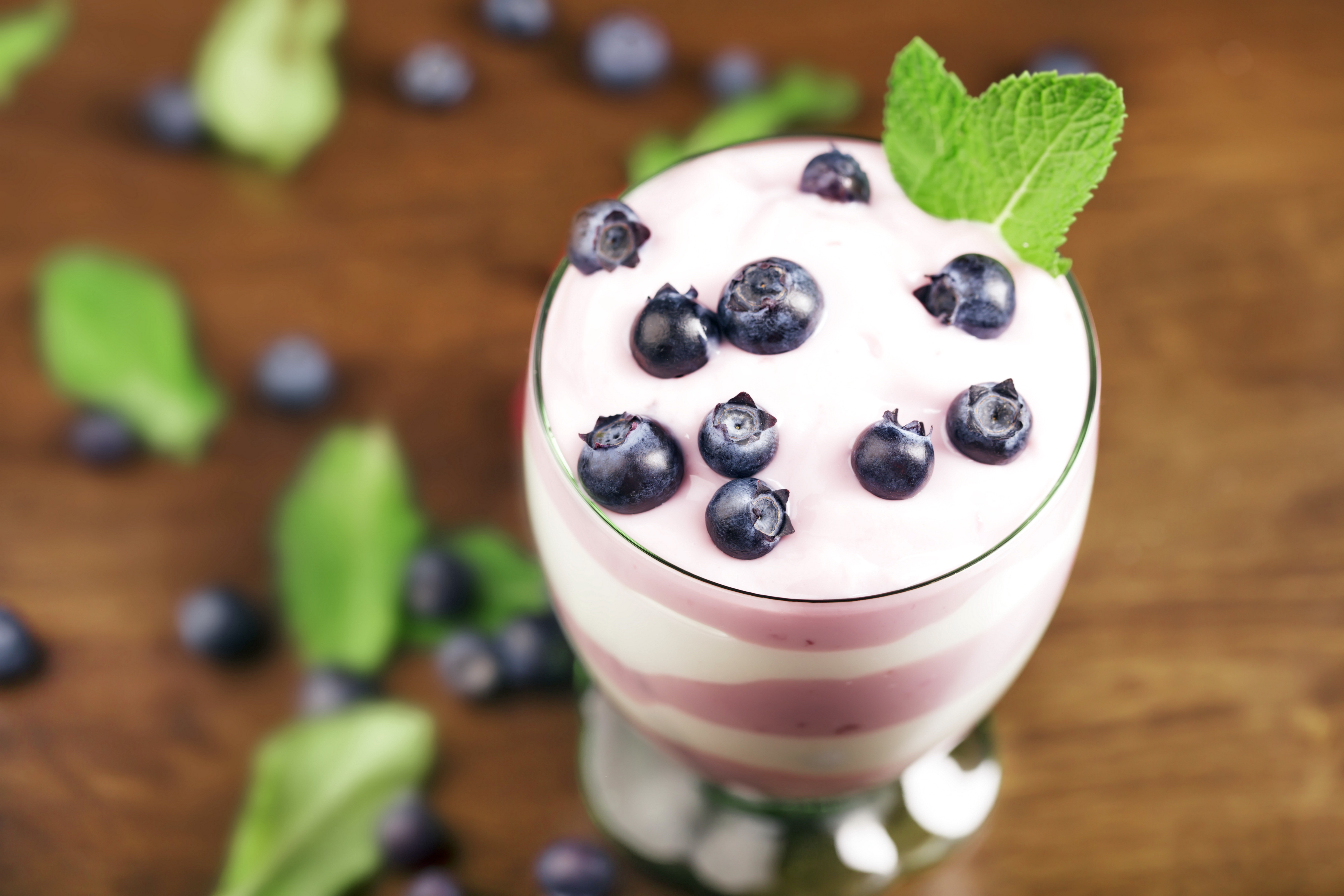 Download mobile wallpaper Food, Dessert, Blueberry, Blur, Glass, Berry, Yogurt for free.