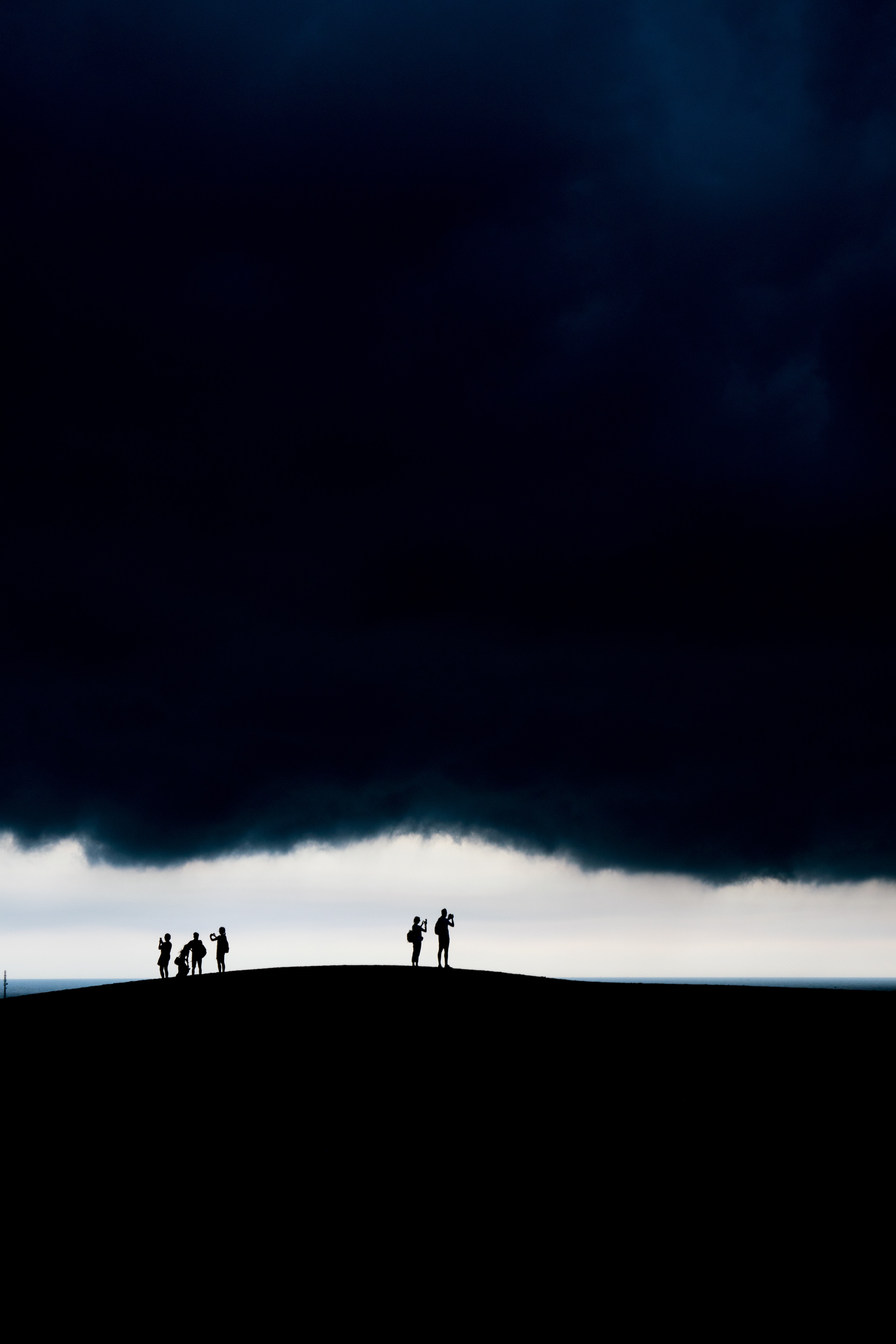 Download mobile wallpaper Clouds, Sky, Silhouettes, Dark for free.