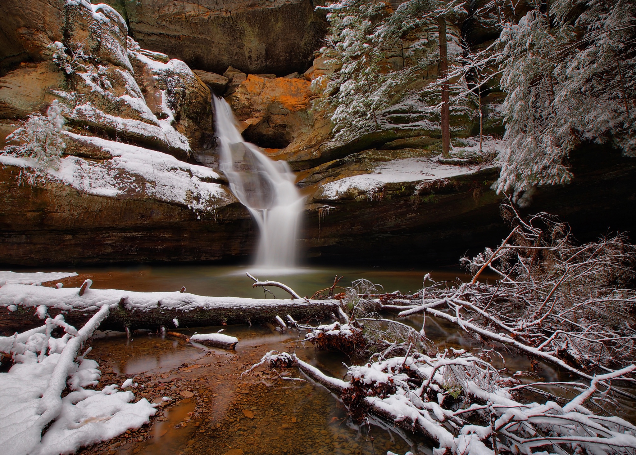 Download mobile wallpaper Winter, Nature, Waterfalls, Snow, Waterfall, Earth, Log for free.