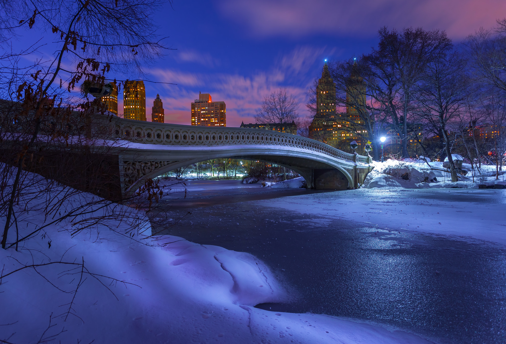 Download mobile wallpaper Winter, Night, Snow, Bridge, New York, Central Park, Man Made, Bow Bridge for free.