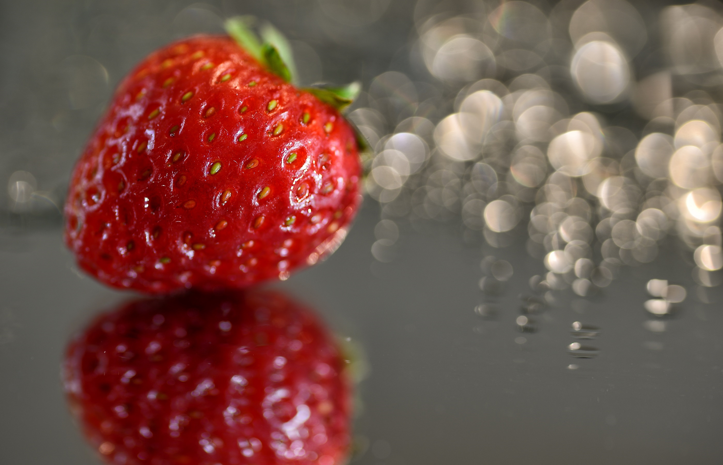 Download mobile wallpaper Fruits, Food, Strawberry, Reflection, Berry, Fruit, Bokeh for free.