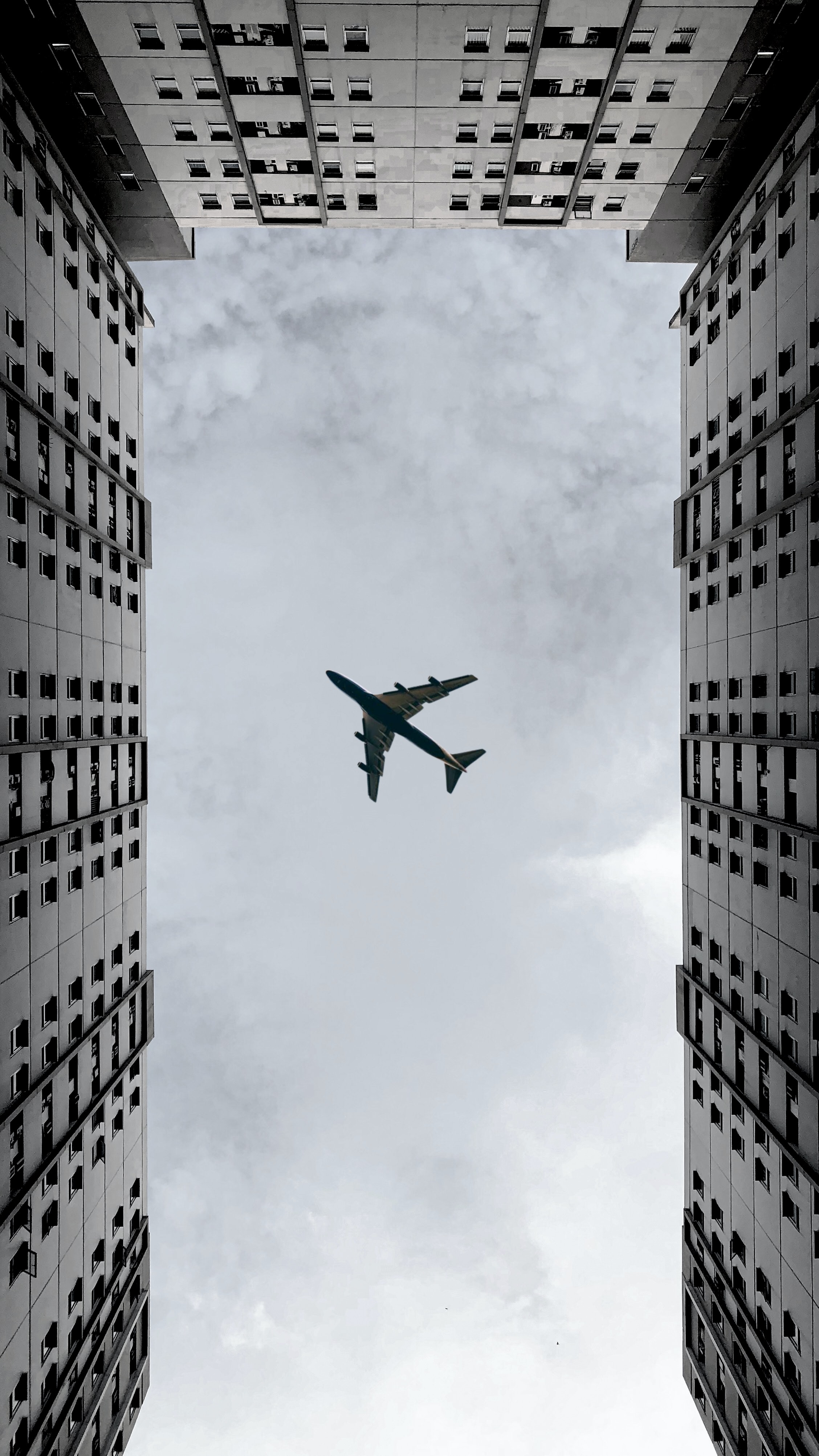 grey, plane, clouds, building, miscellanea, miscellaneous, airplane, bottom view 4K