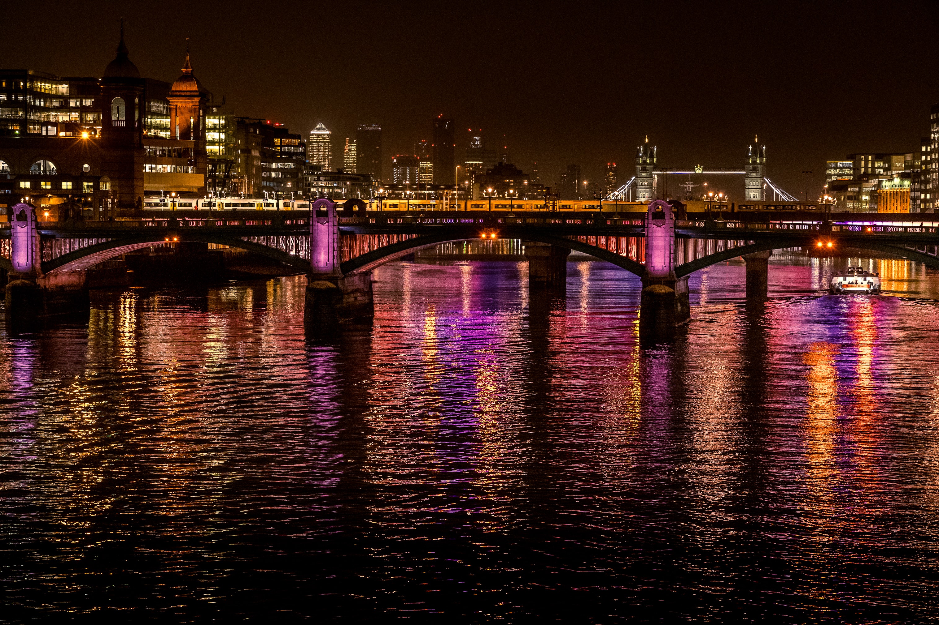 Download mobile wallpaper Reflection, Bridge, City, Cities, Lights, Water, Night City for free.