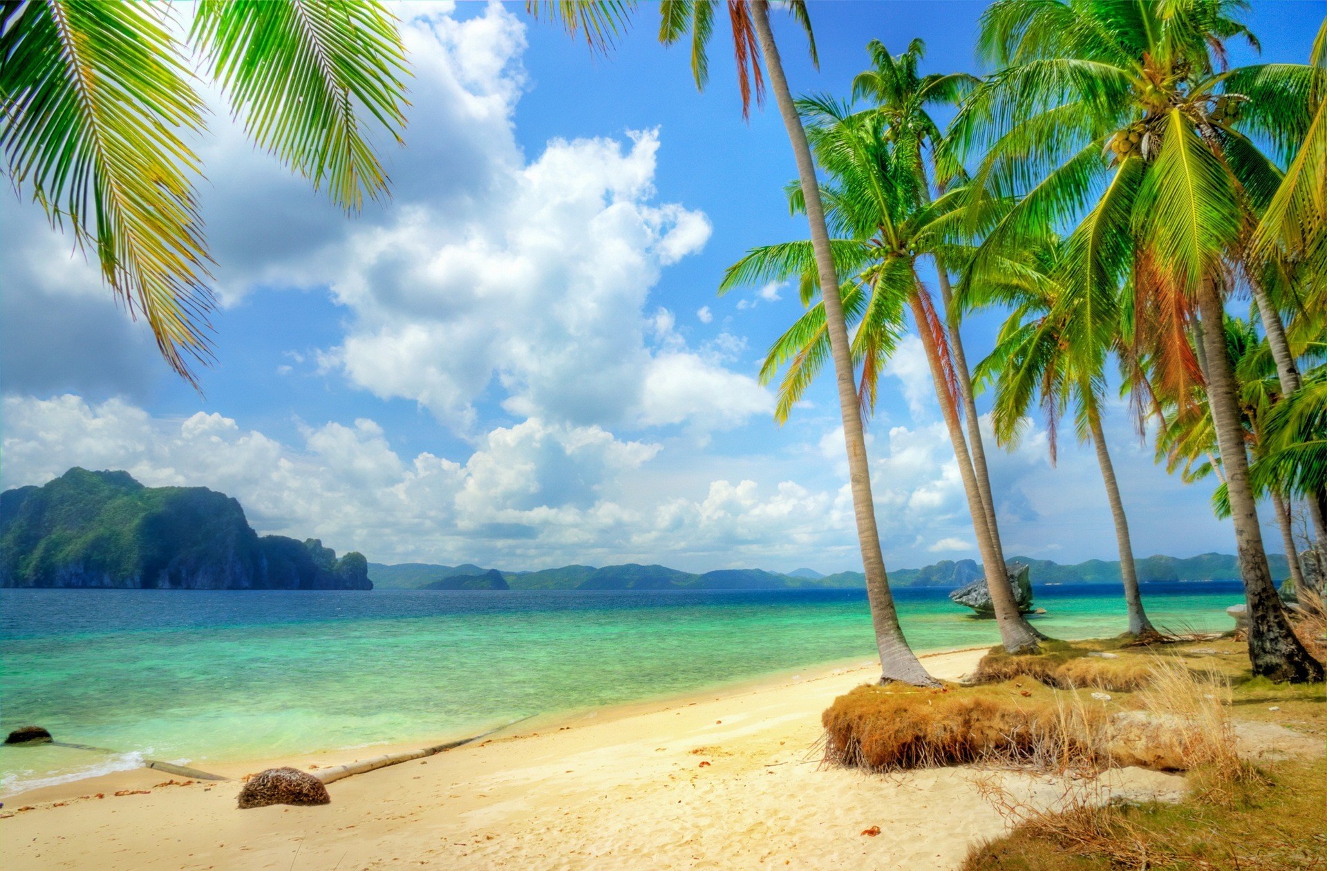 Скачать картинку Море, Пляж, Пальмы, Тропики, Лагуна, Тропический, Земля/природа в телефон бесплатно.