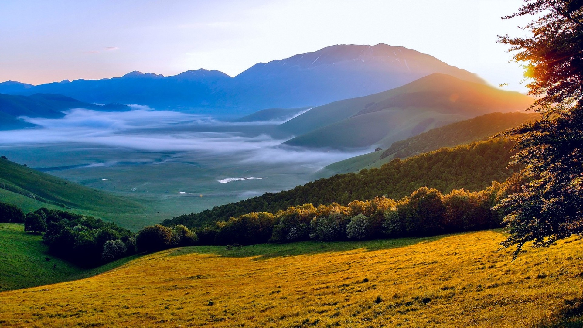 Handy-Wallpaper Italien, Sonnenaufgang, Tal, Erde/natur kostenlos herunterladen.