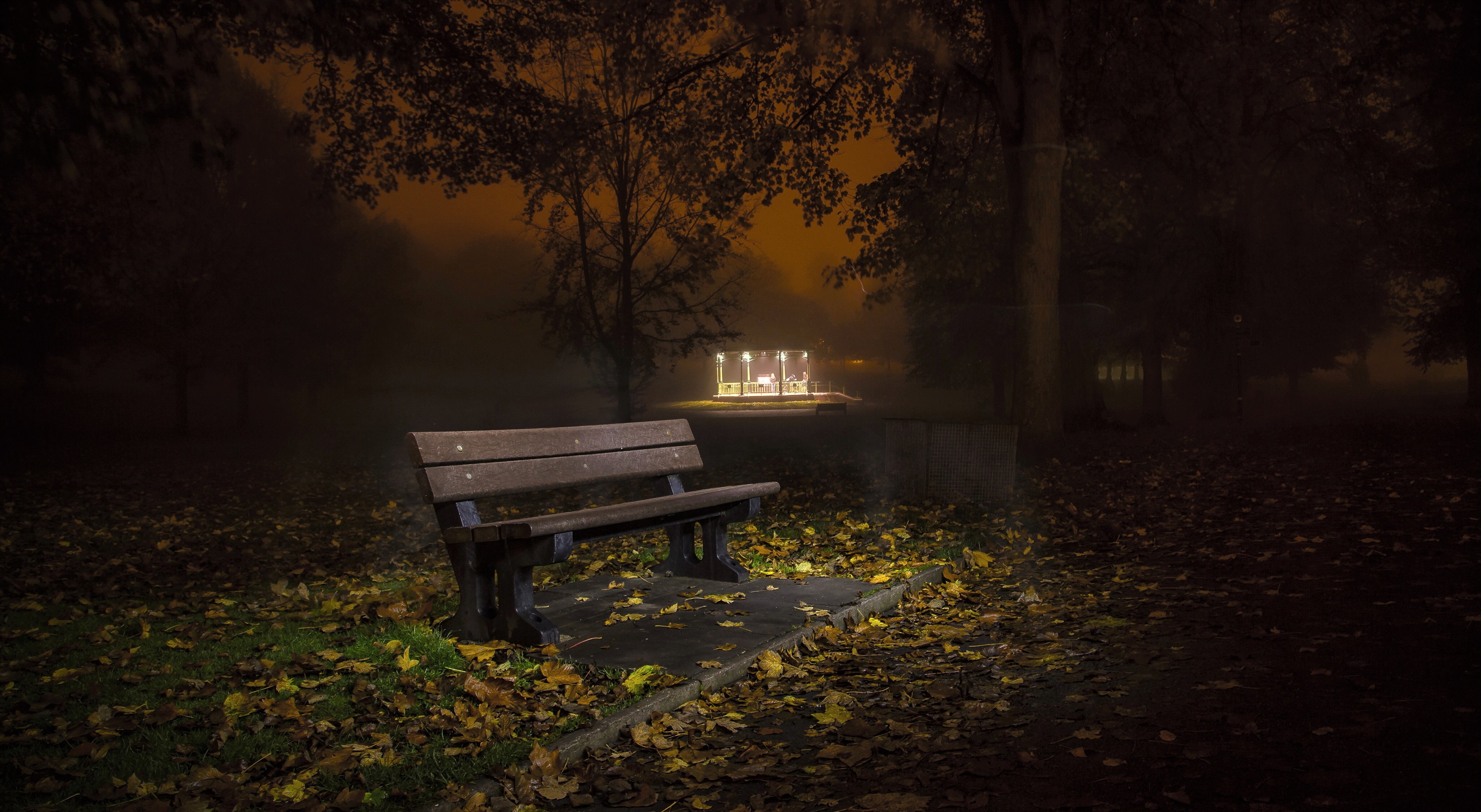 Download mobile wallpaper Night, Light, Park, Fall, Bench, Man Made for free.