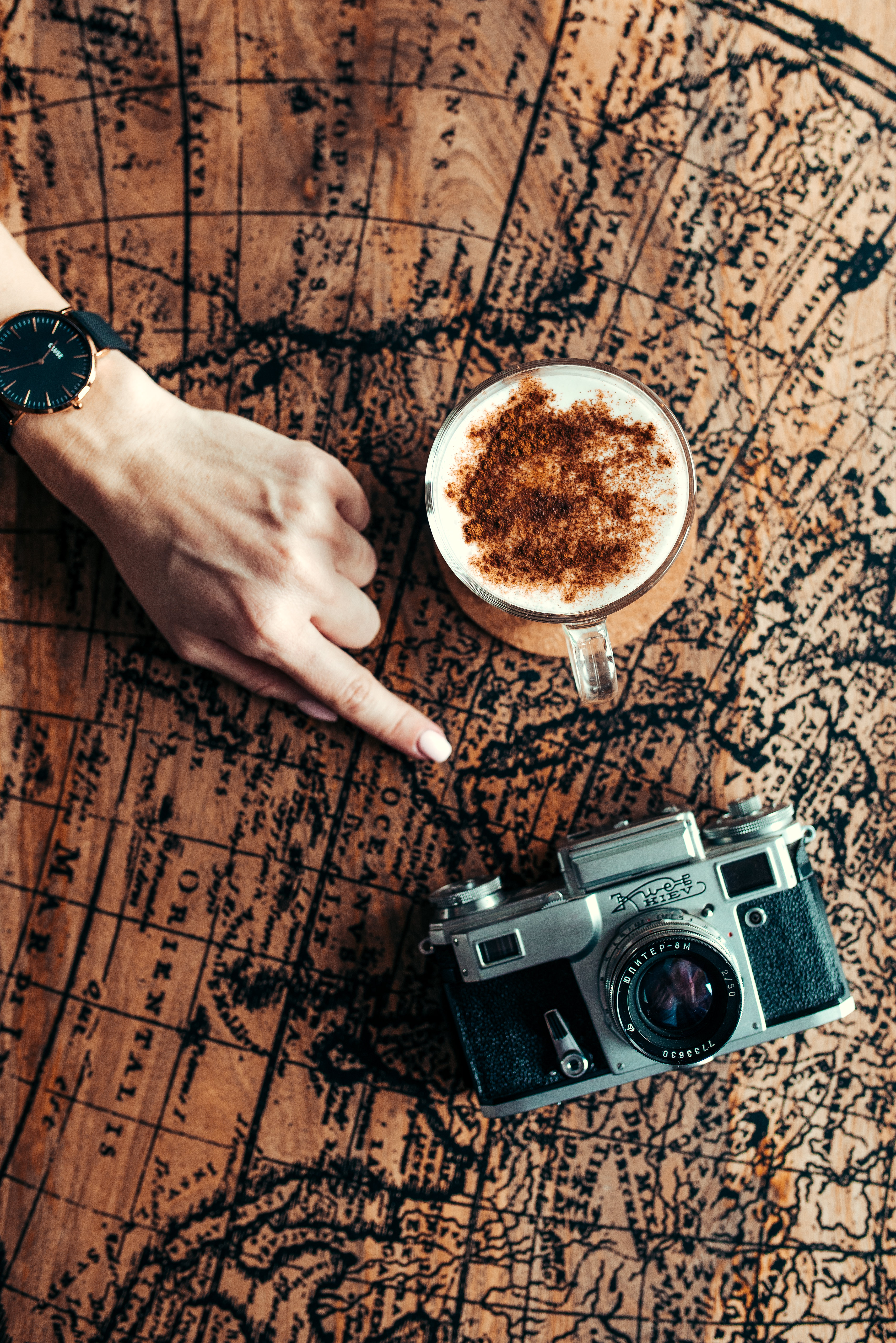 Download mobile wallpaper Cup, Miscellanea, Miscellaneous, Map, Hand, Camera for free.
