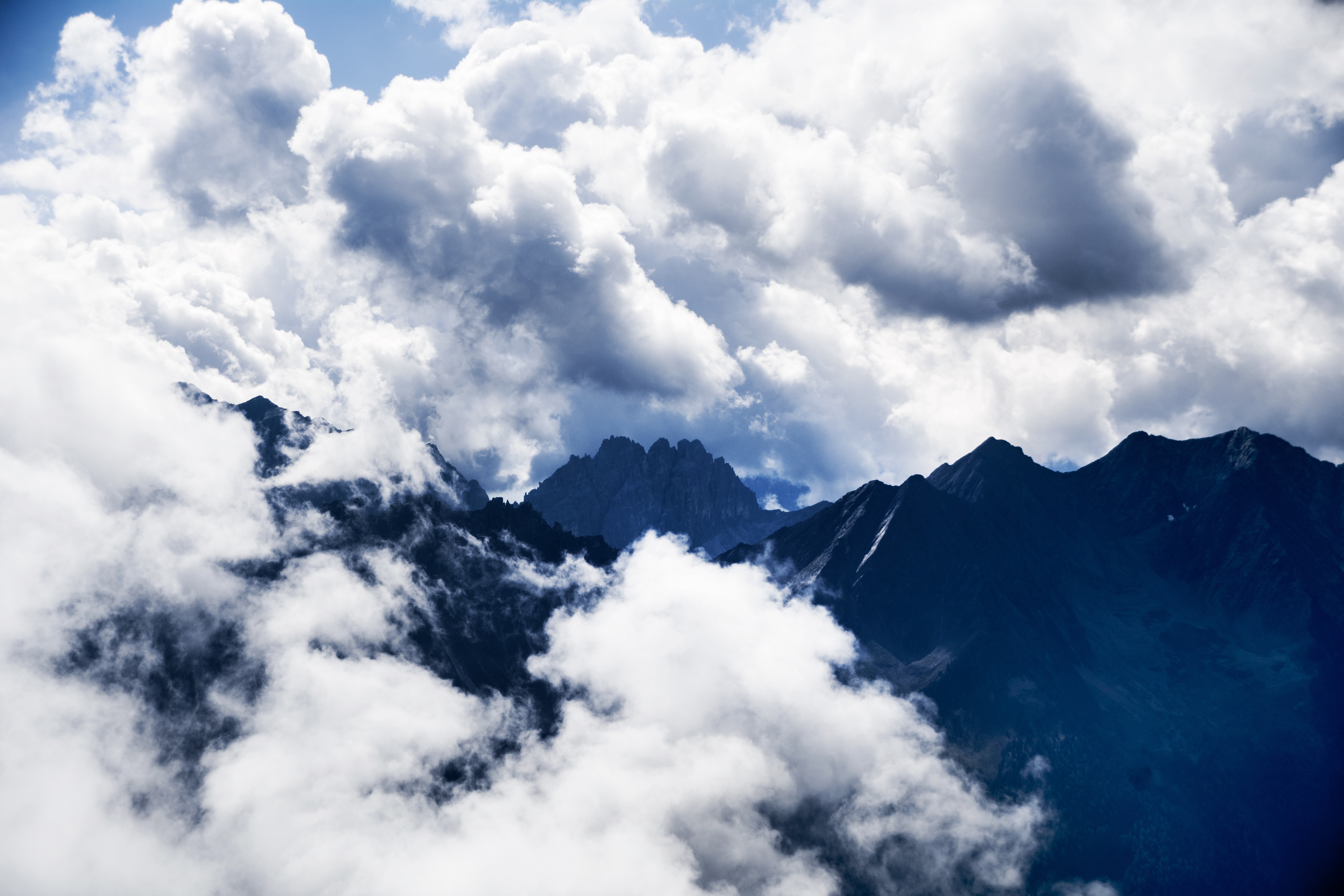 Download mobile wallpaper Top, Vertex, Clouds, Nature, Sky, Mountains for free.