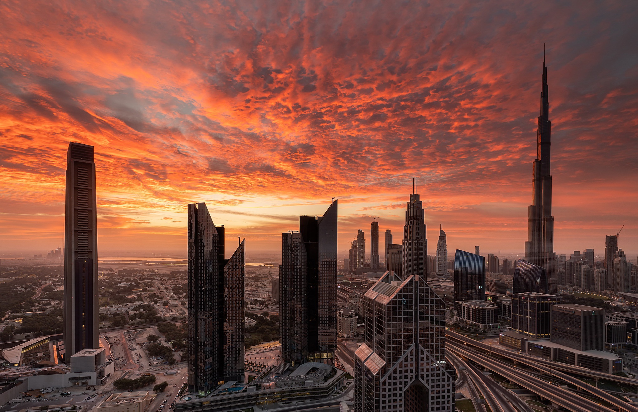 Download mobile wallpaper Cities, Sunset, City, Skyscraper, Building, Dubai, Cityscape, Man Made for free.