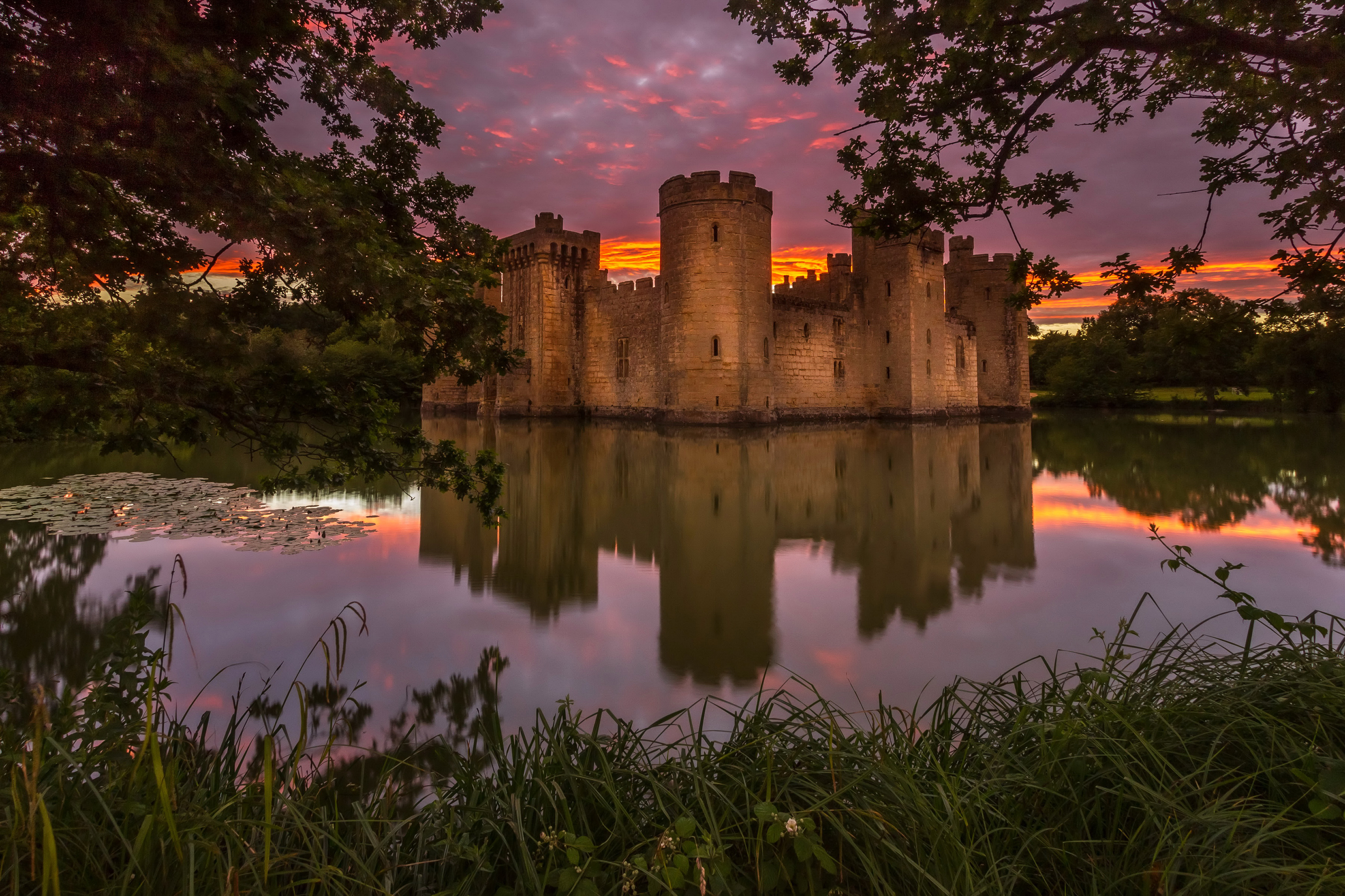 Download mobile wallpaper Sunset, Castles, Reflection, Pond, Man Made, Castle for free.