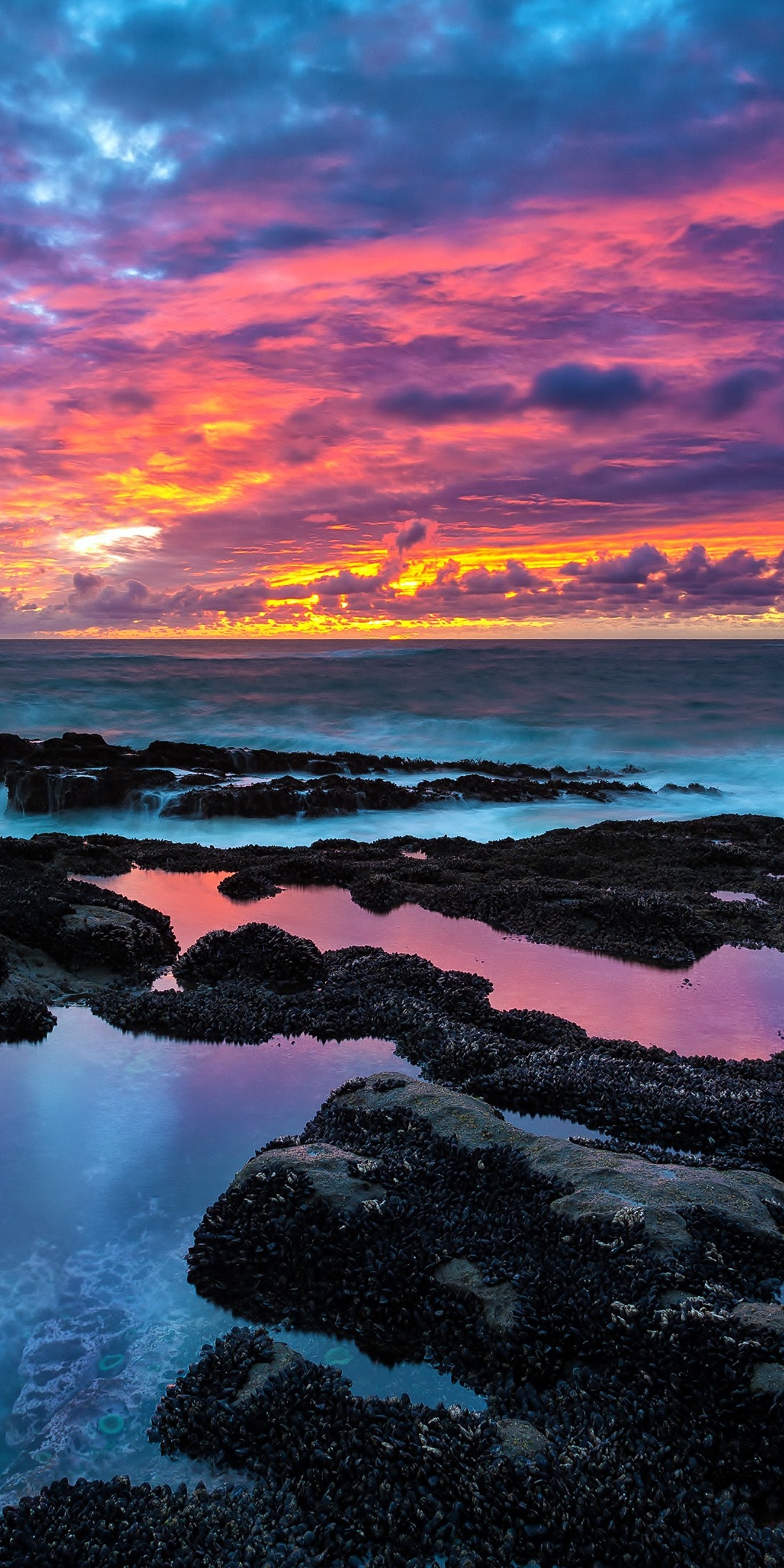 Download mobile wallpaper Sunset, Sky, Sea, Ocean, Earth for free.
