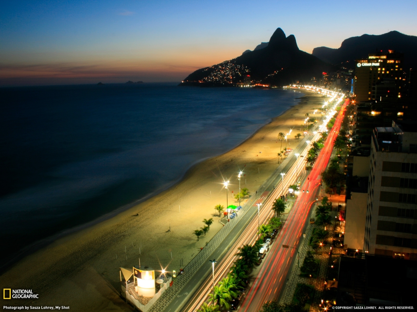 Free download wallpaper Cities, Roads, Mountains, Sea, Night, Landscape, Beach on your PC desktop