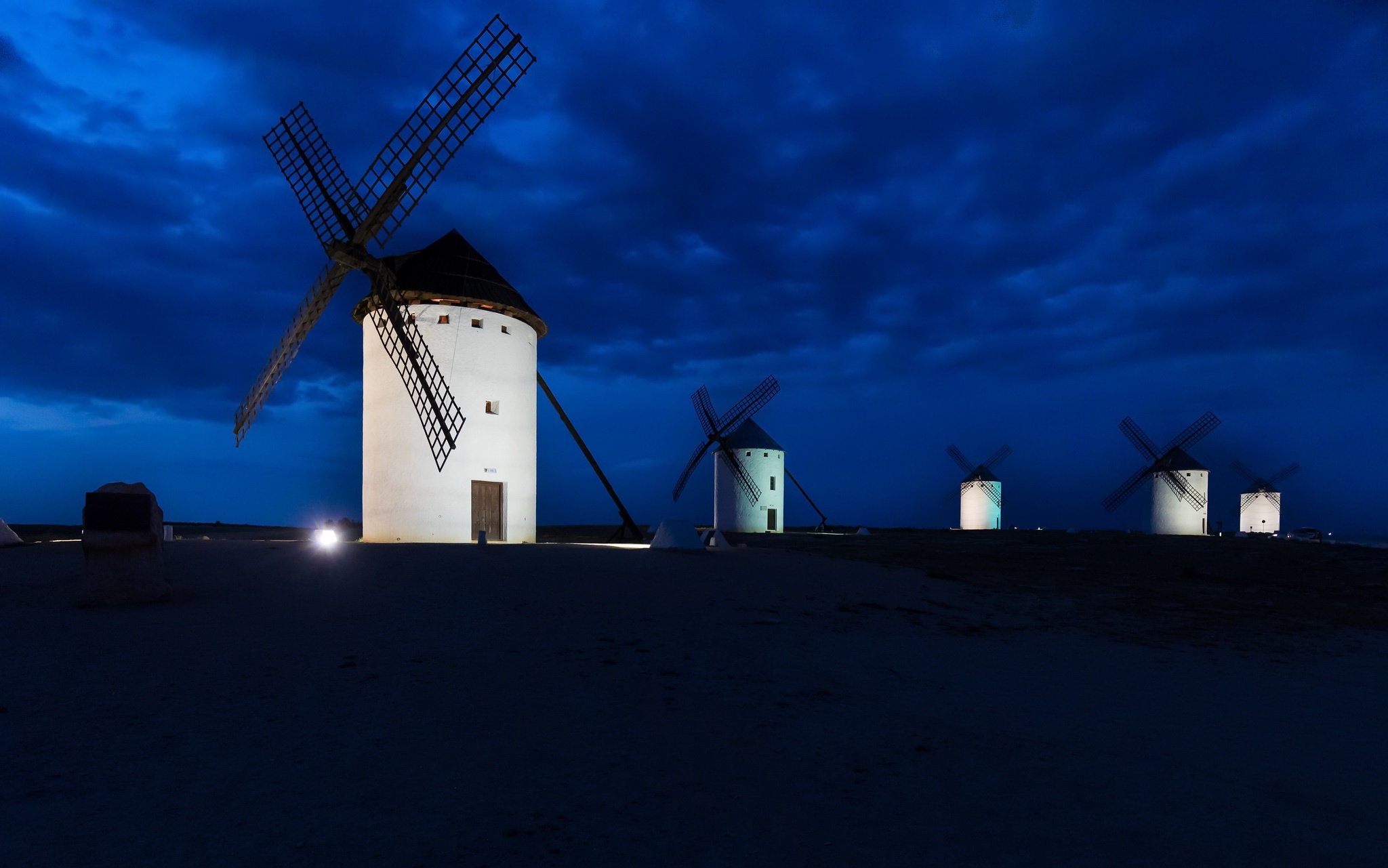 Download mobile wallpaper Sky, Night, Building, Cloud, Windmill, Man Made for free.