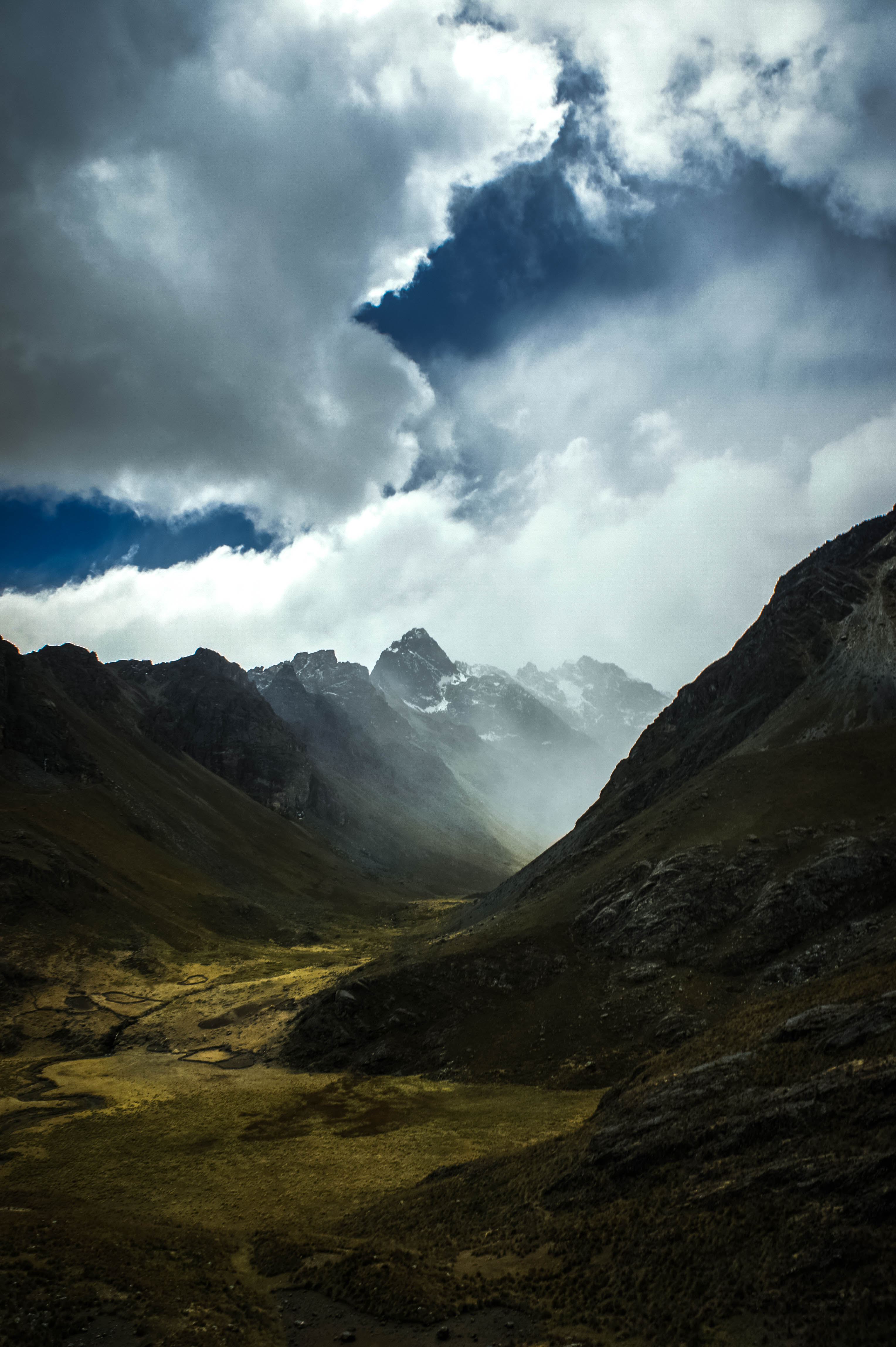 Download mobile wallpaper Slope, Rocks, Clouds, Nature, Fog, Mountains for free.